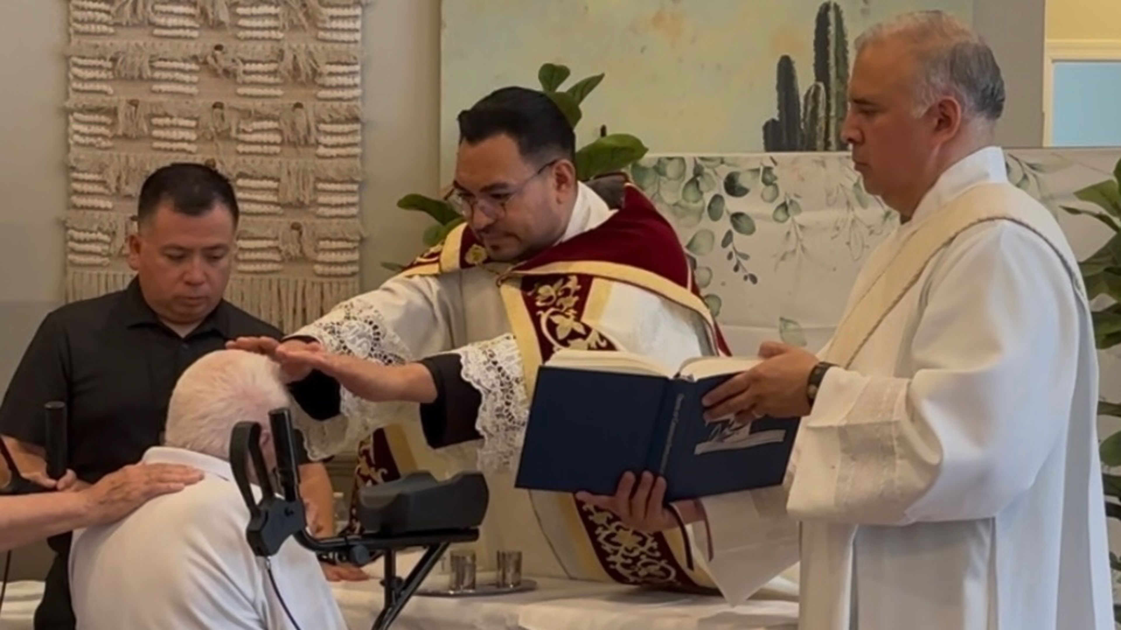 Father Edson Elizarraras, pastor of St. Christopher in Marana, Arizona, gives Raymond Martin a blessing. | Credit: Photo courtesy of Deacon Jack Trevino
