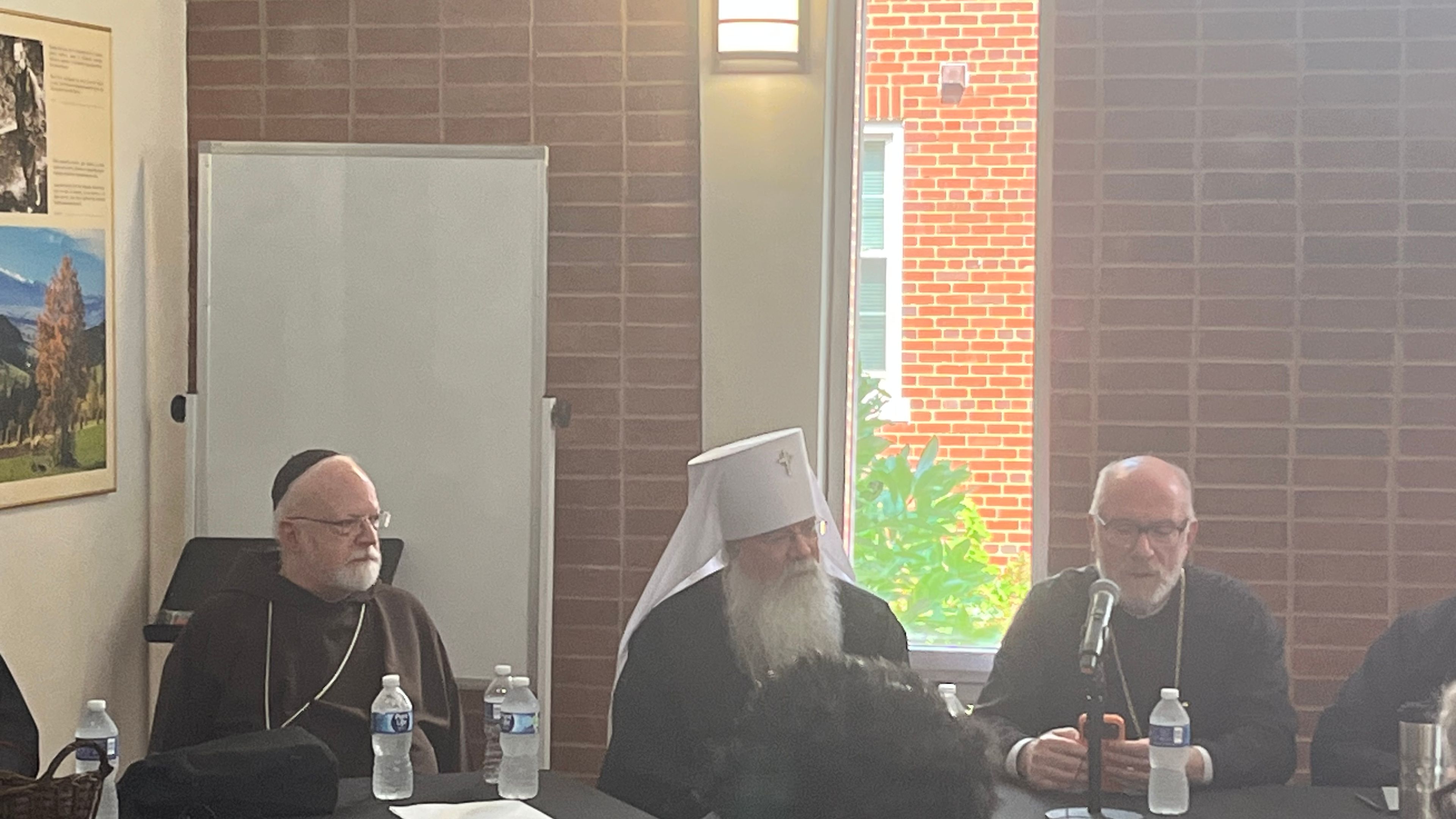 Cardinal Seán Patrick O’Malley, left; Metropolitan Tikhon Mollard primate of the Orthodox Church in America, center; and Greek Orthodox Bishop Anthony Vrame, right, participate in a panel at the Orientale Lumen Foundation conference in Washington, D.C., on July 14, 2026. | Credit: Tyler Arnold/EWTN News