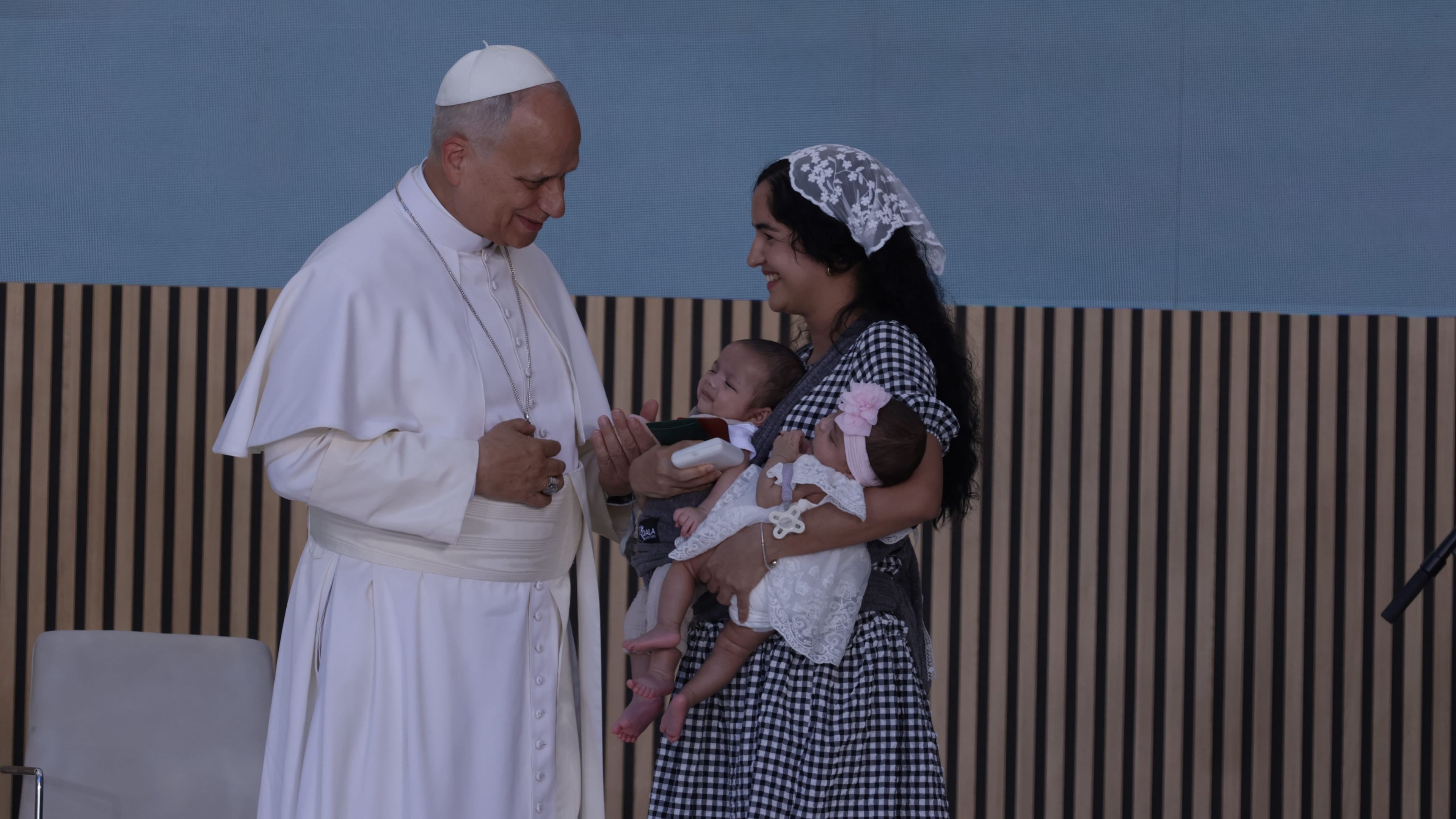 Pope Leo XIV meets a woman from Cuba and her twin babies during an encounter with staff and beneficiaries, including migrants, of the CEDIA 24 Horas center, part of the Caritas of the Archdiocese of Madrid in Spain on June 6, 2026. | Credit: Daniel Ibañez/EWTN News