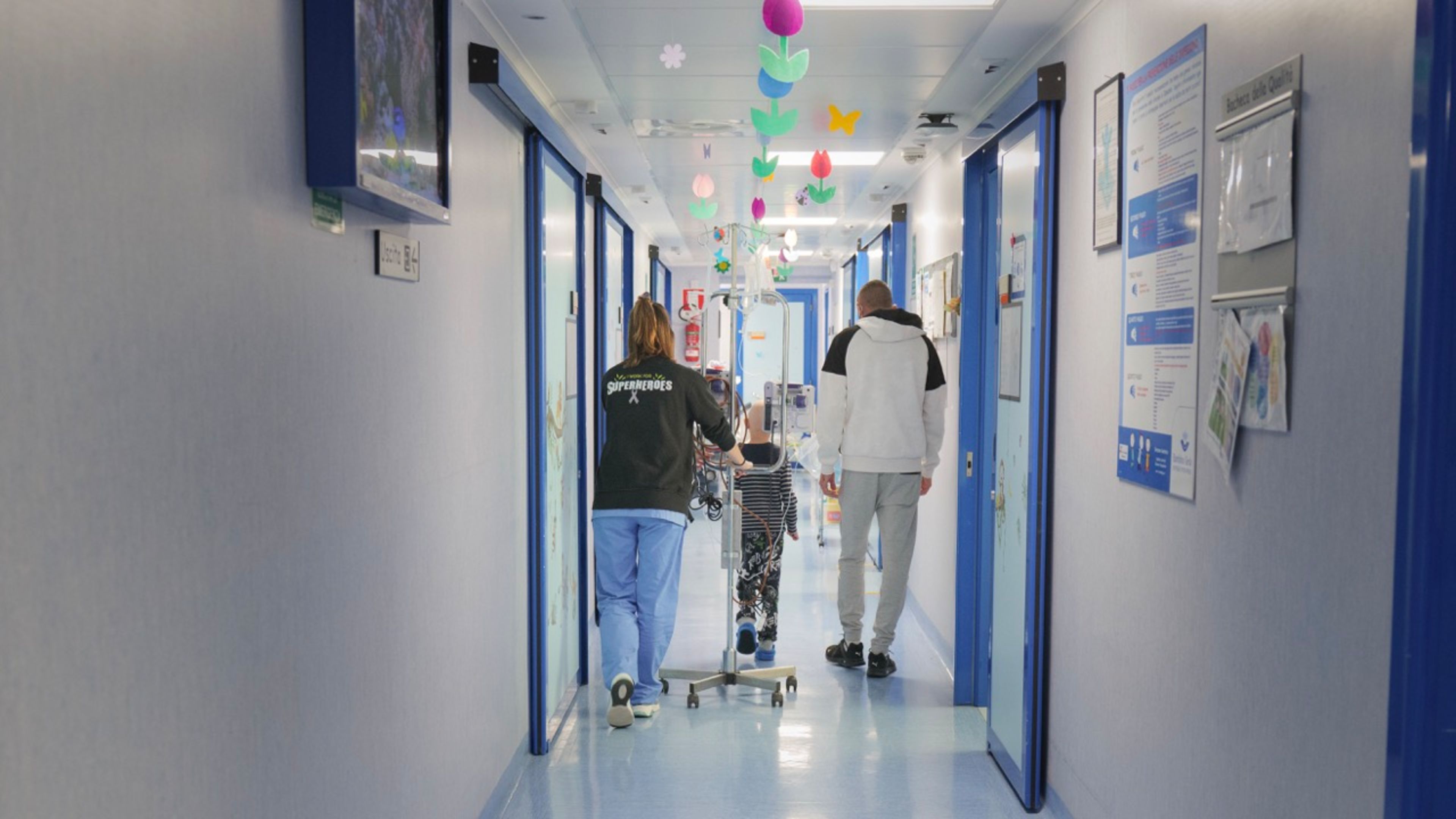 A patient in rehabilitation walks down the hall of Bambino Gesù Pediatric Hospital. | Credit: Bambino Gesù Pediatric Hospital