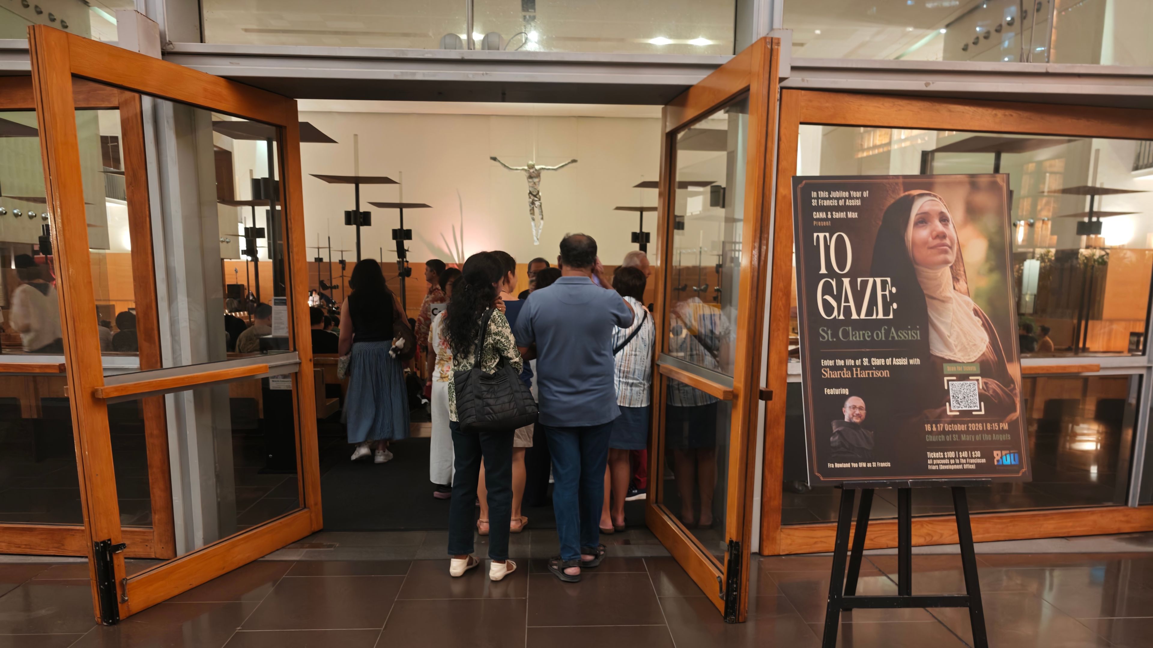 The audience arrives at the Church of St. Mary of the Angels in Singapore for the opening night of the performance “TO GAZE: St. Clare of Assisi,” on Oct. 16, 2026. | Credit: Benedict Tang