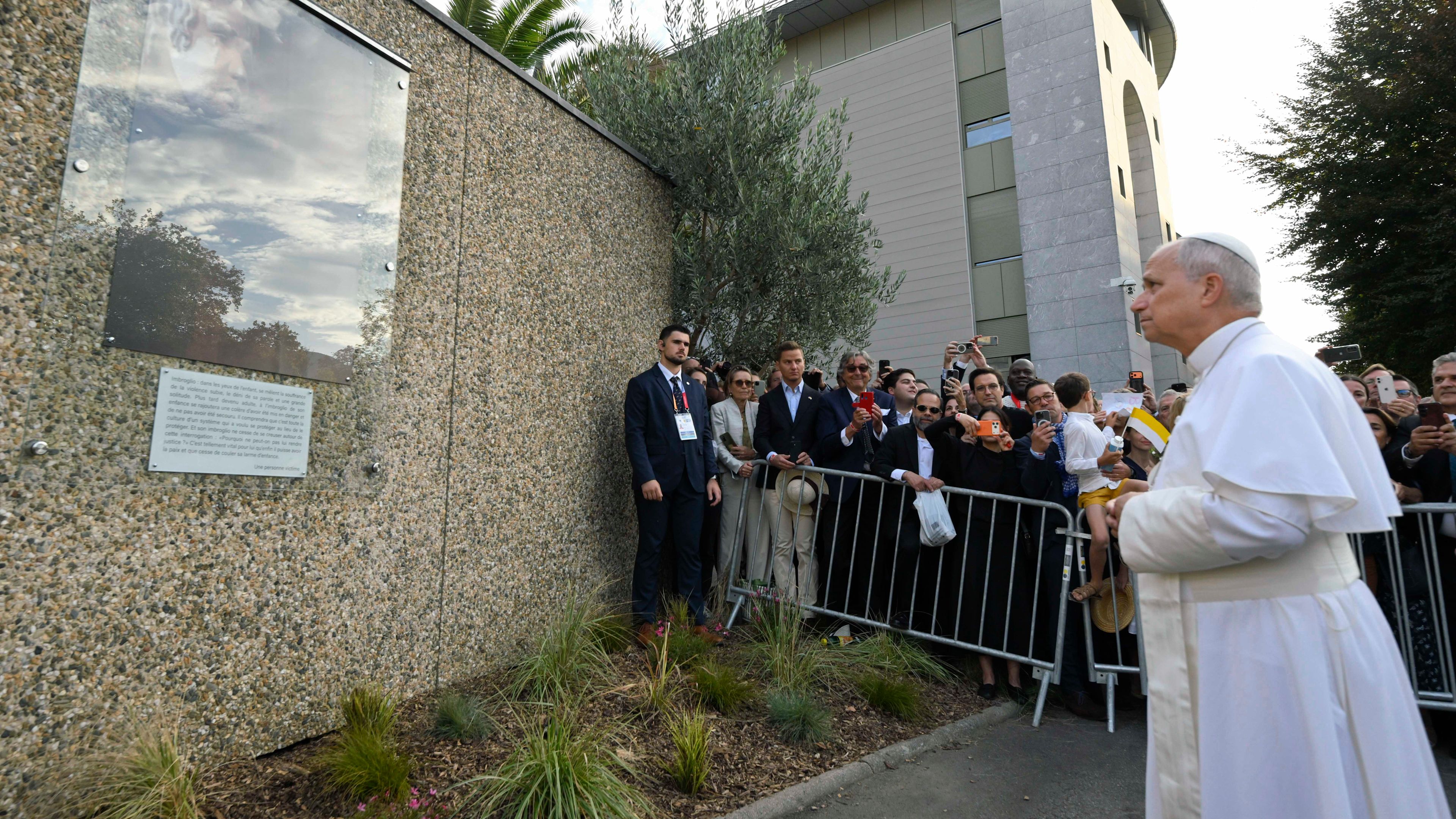 Pope Leo XIV looks at a memorial dedicated to victims of clerical sexual abuse in Lourdes, France, on Sept. 27, 2026. | Credit: Vatican Media