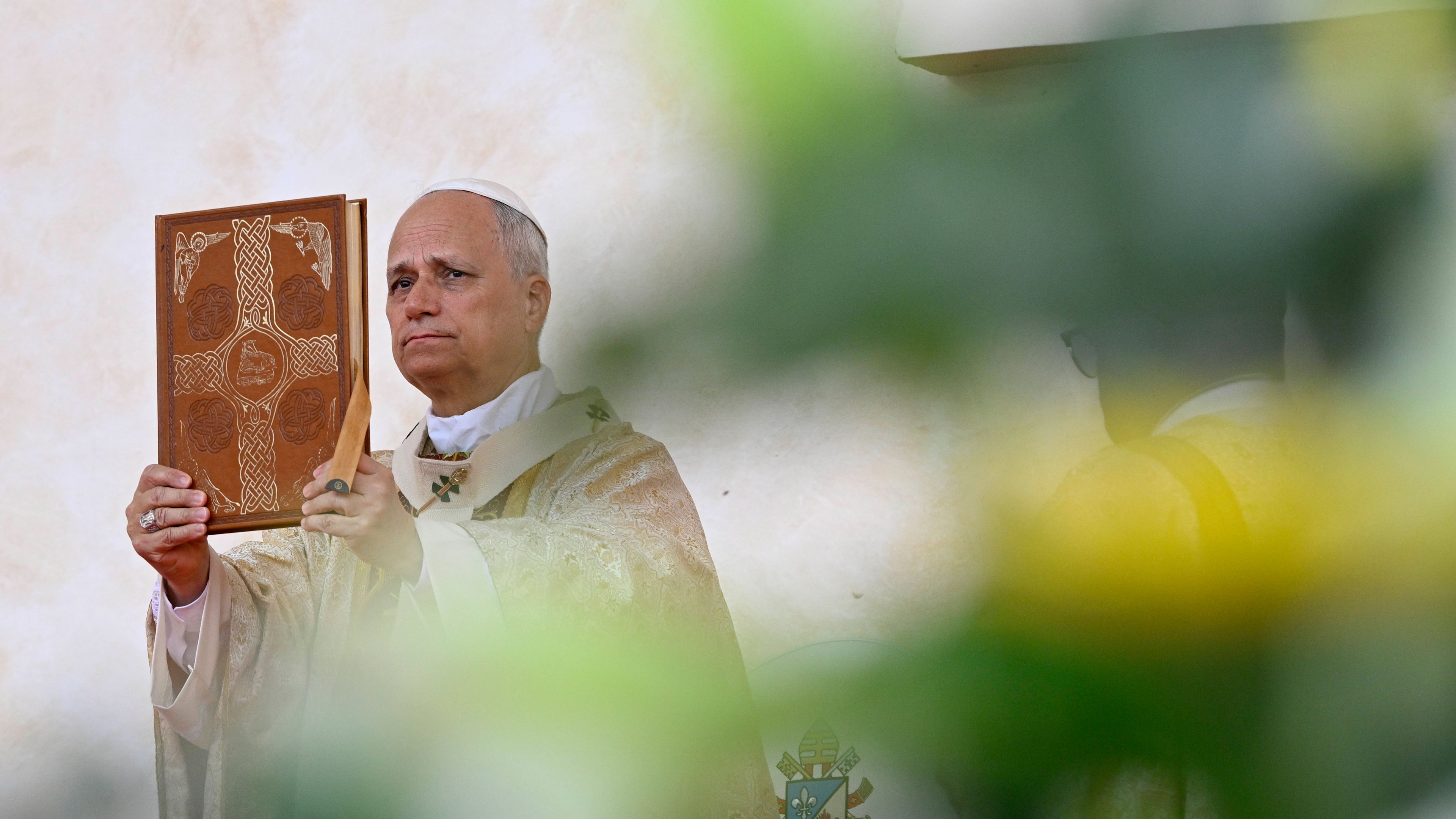 PHOTOS: Pope Leo XIV departs Africa, returns to Rome after 11-day papal trip