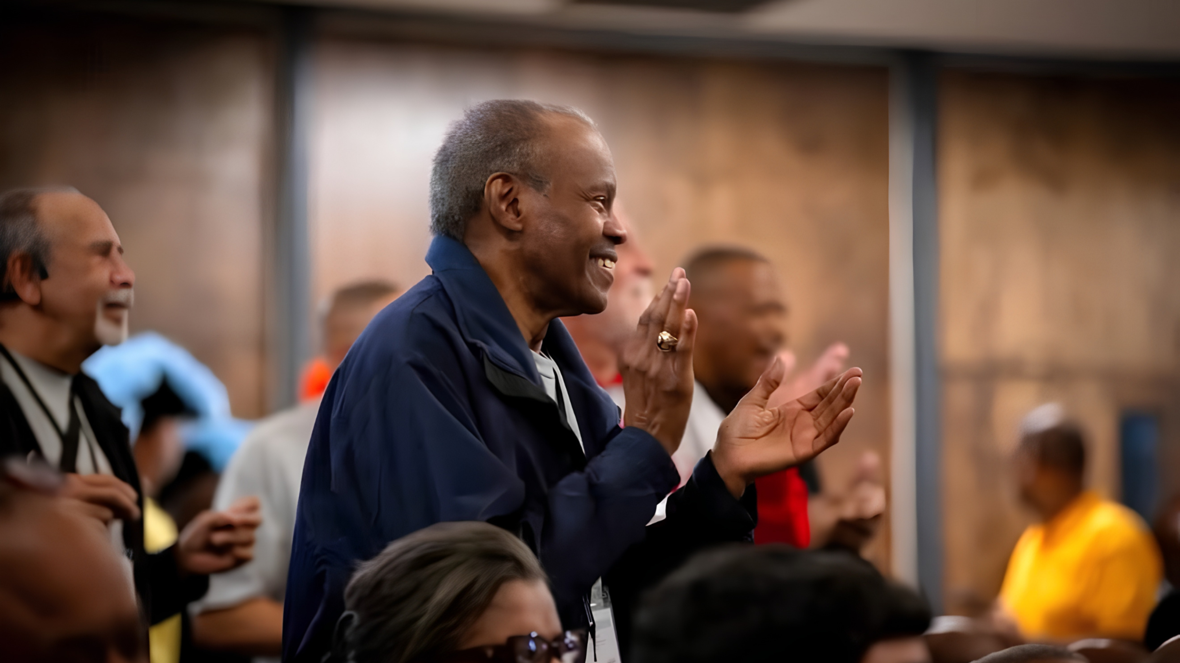 A participant applauds during the Fr. Chester P. Smith National Black Catholic Men’s Conference, which took place Oct. 15–18, 2026, in Birmingham, Alabama. | Credit: Brent Patterson