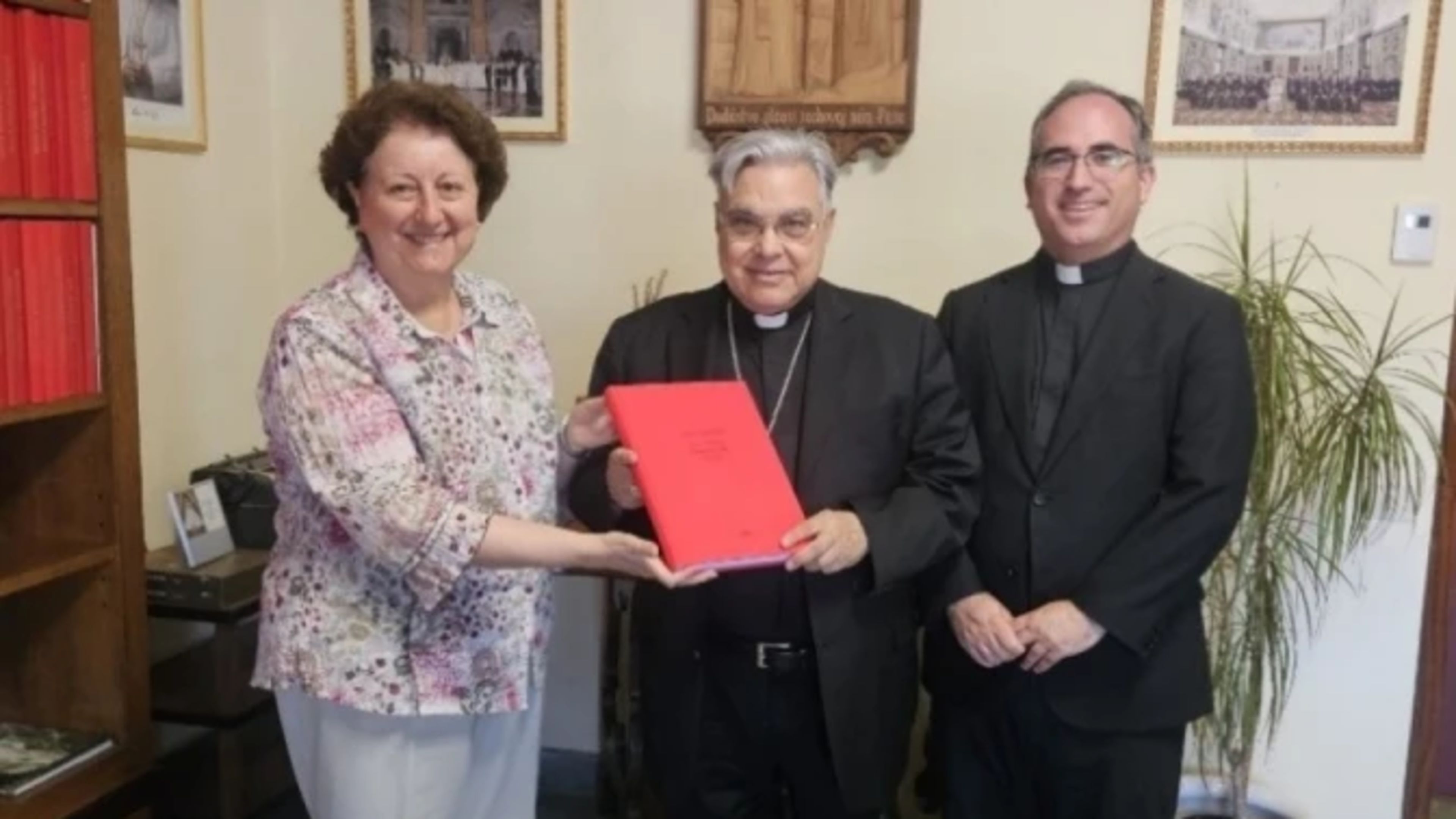 Lourdes Grosso, director of the Spanish Bishops’ Conference’s Office for the Causes of Saints, left; Cardinal Marcello Semeraro, prefect of the Vatican's dicastery, center; and Father Fernando del Moral, the office’s deputy director, right. | Credit: Spanish Bishops’ Conference