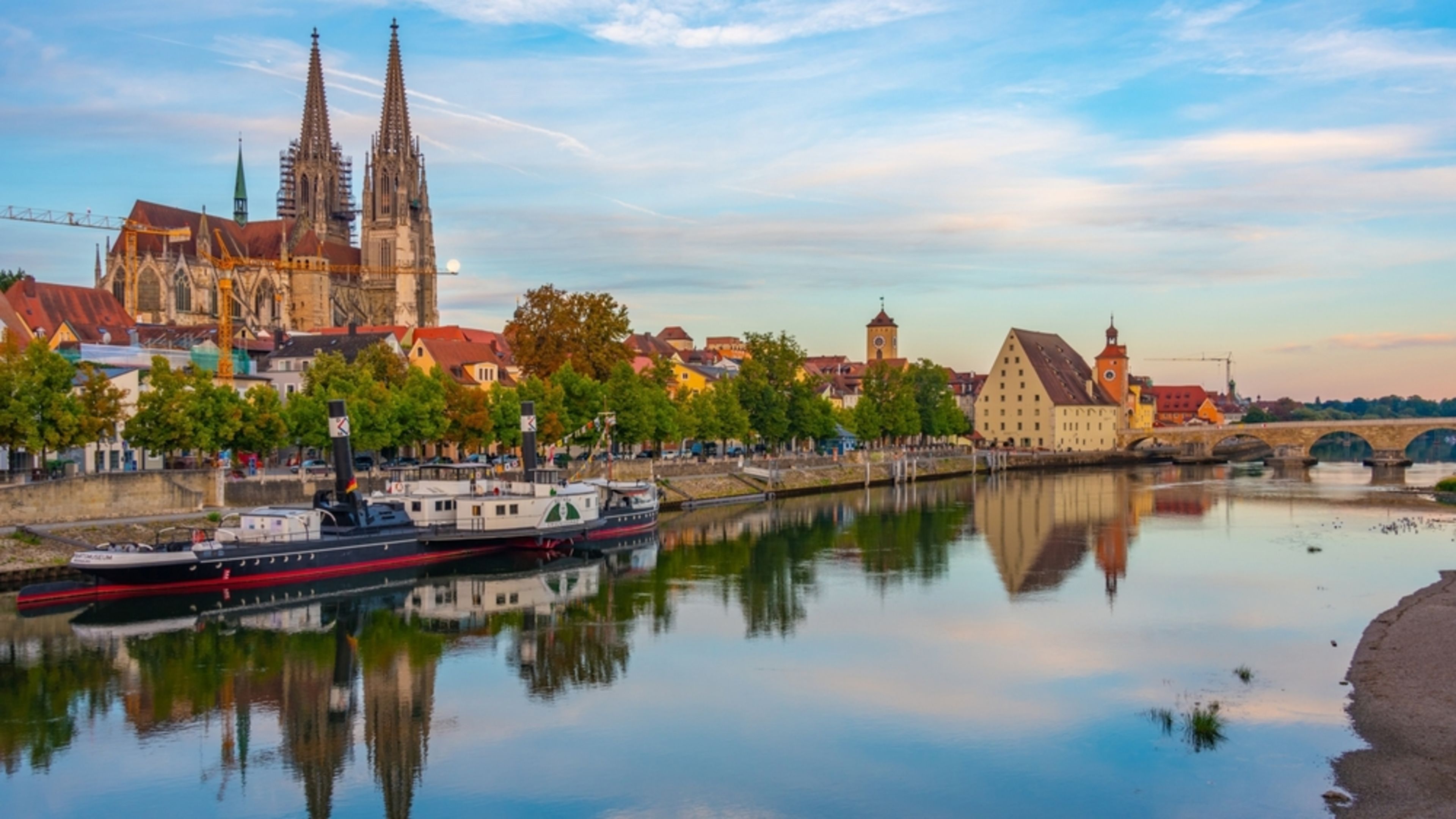 The Regensburg Cathedral and Stone Bridge are seen along the Danube River in Regensburg, Germany, in an undated photo. | Credit: trabantos/Shutterstock