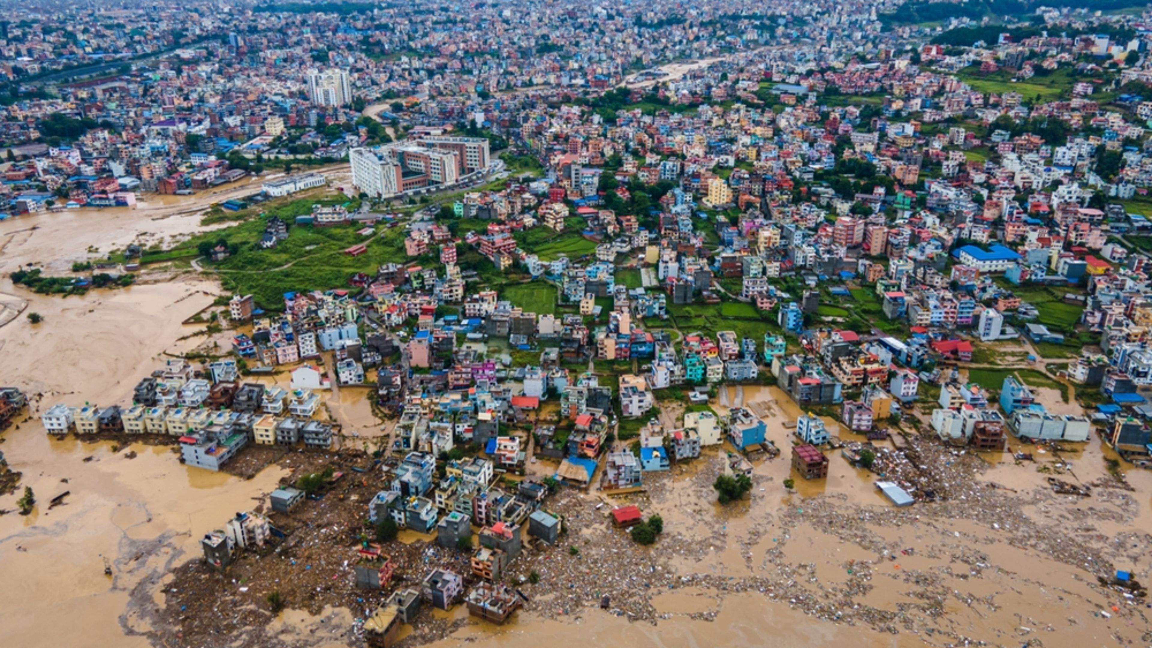 Drone view of the Nakhu River flooded and affected the riverbanks and homes during heavy rainfall in Lalitpur, Nepal. | Credit: AP Tolang/Shutterstock