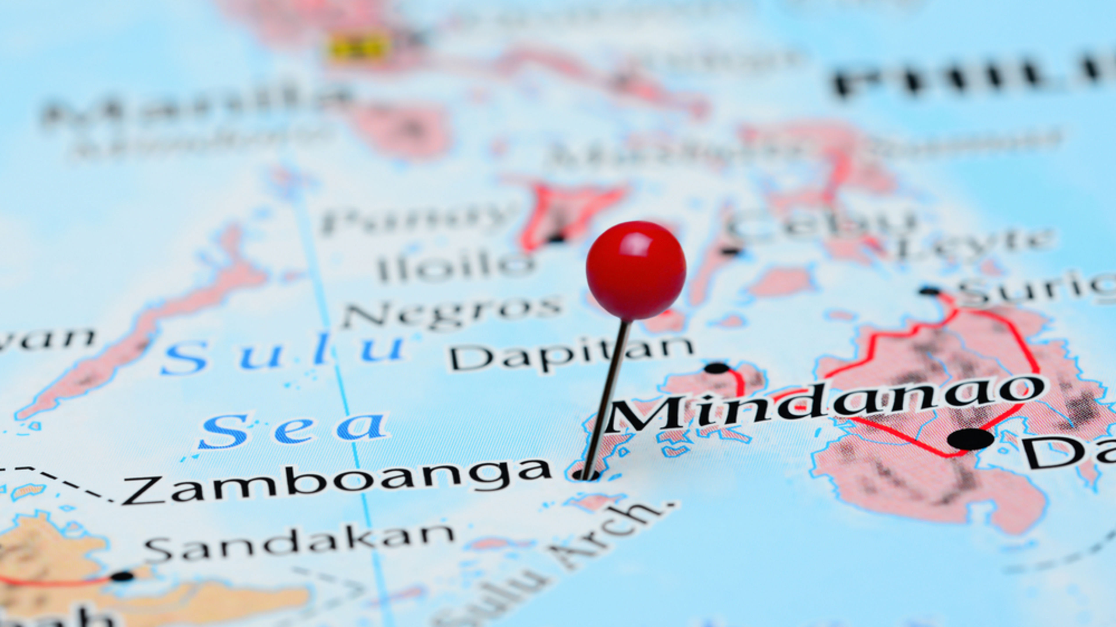 A pin marks Zamboanga City on a map of Mindanao in the southern Philippines, where a shooting at the junior high school campus of Ateneo de Zamboanga University killed two students on Aug. 18, 2026. | Credit: Dmitry Kaminsky/Shutterstock