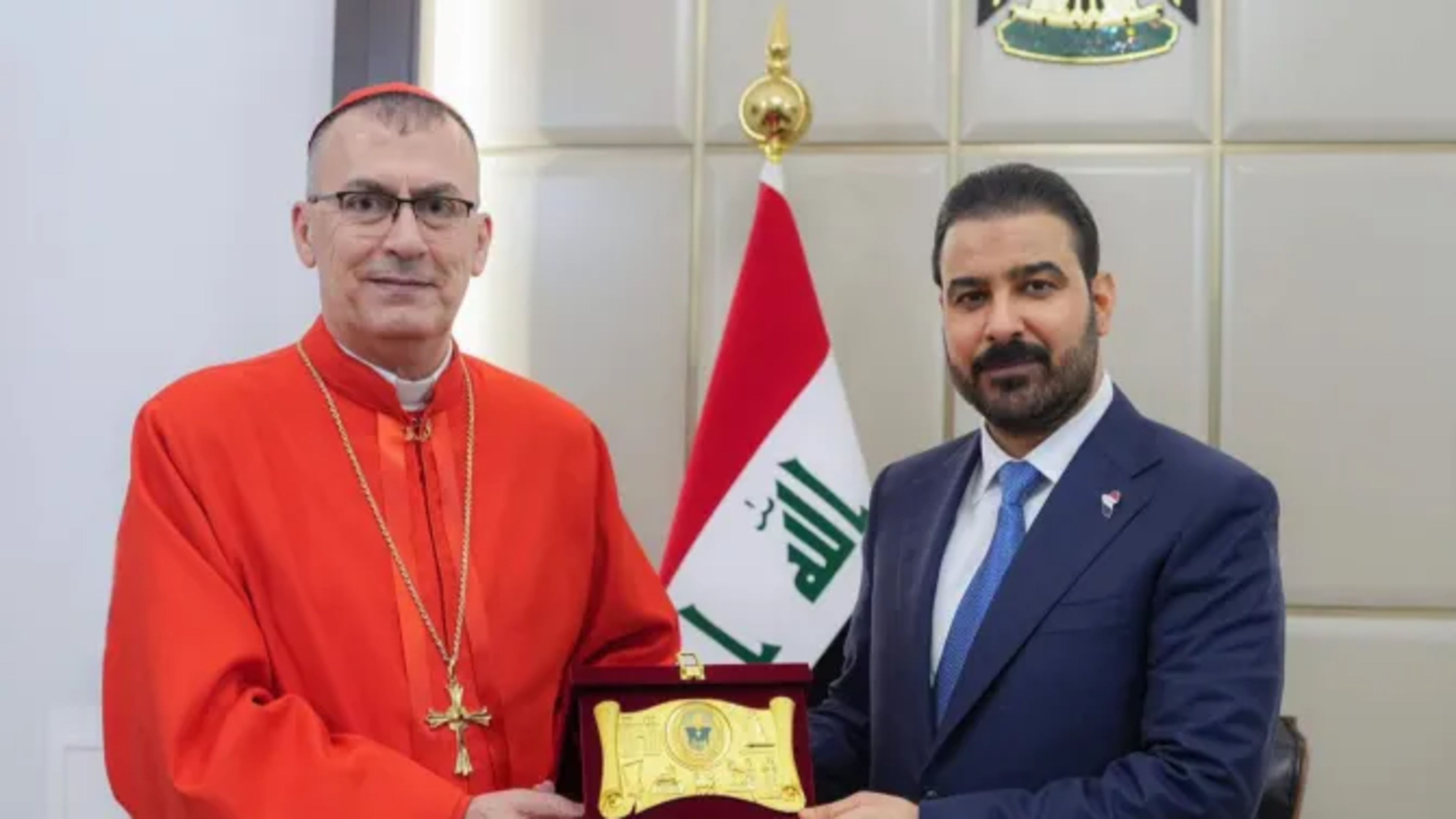 Iraqi Prime Minister Ali al Zaidi, right, receives Chaldean Patriarch Mar Paul III Nona. | Credit: Iraqi prime minister’s media office