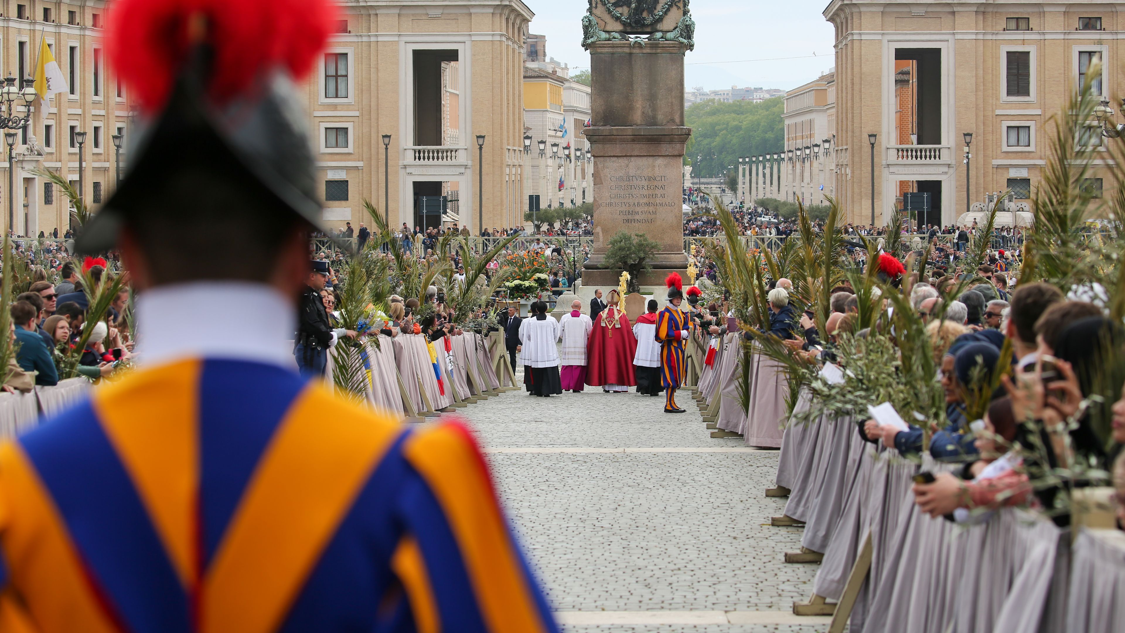 Pope Francis greets pilgrims at Palm Sunday Mass
