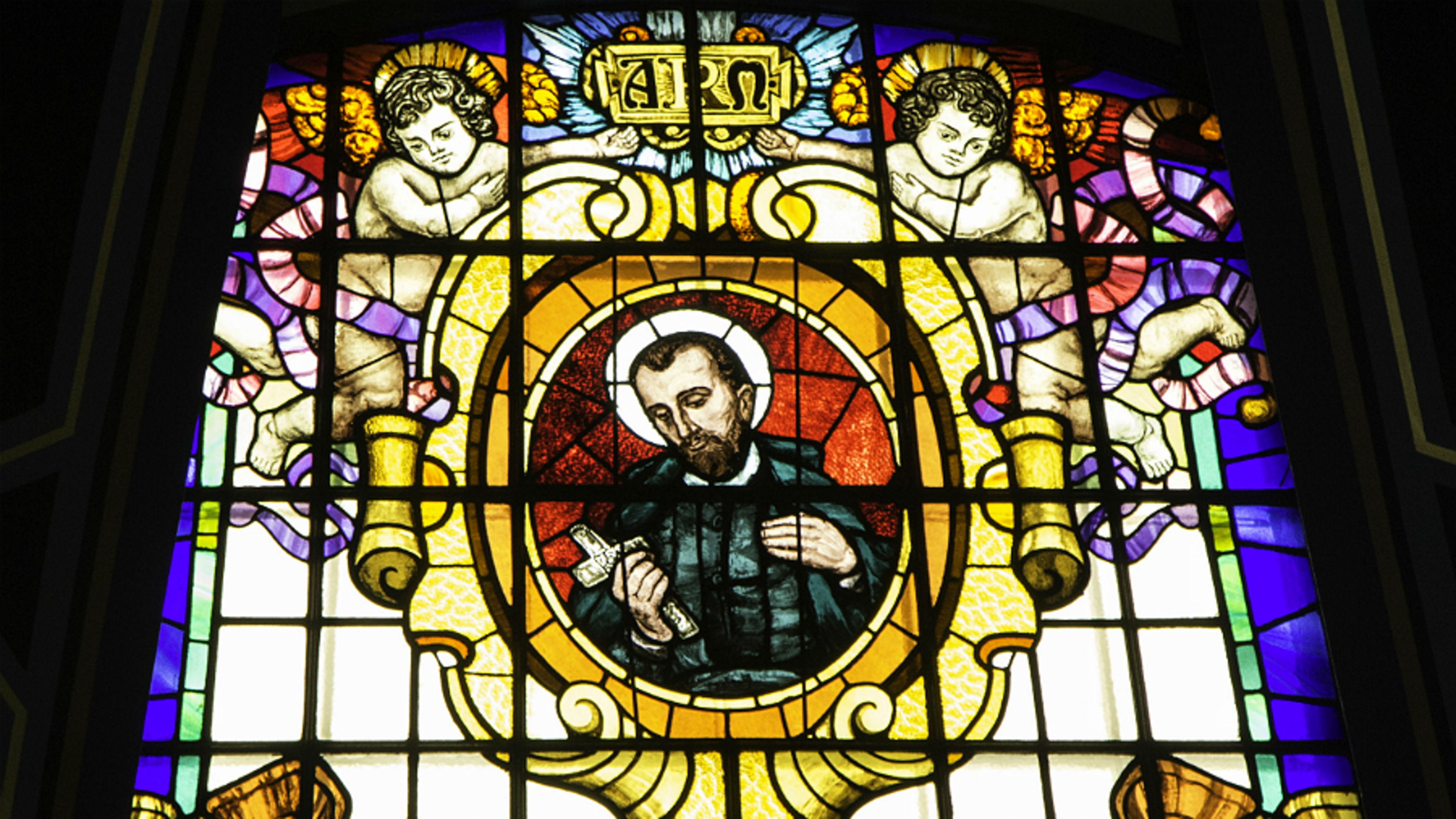 A stained-glass image of St. Peter Claver in St. Aloysius Church, Glasgow. | Credit: Lawrence OP via Flickr (CC BY-NC-ND 2.0)