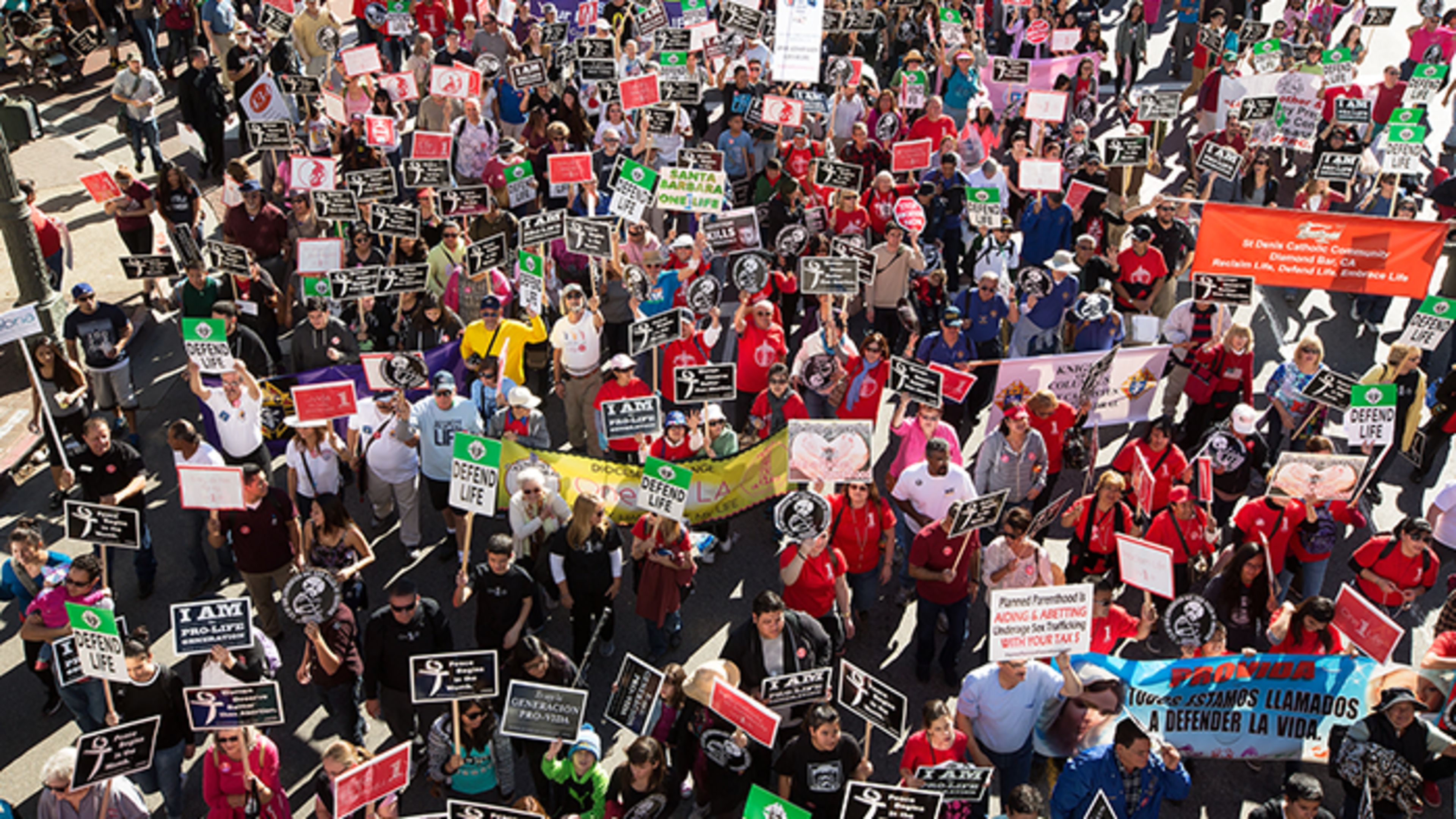 Thousands march to support human dignity in downtown LA