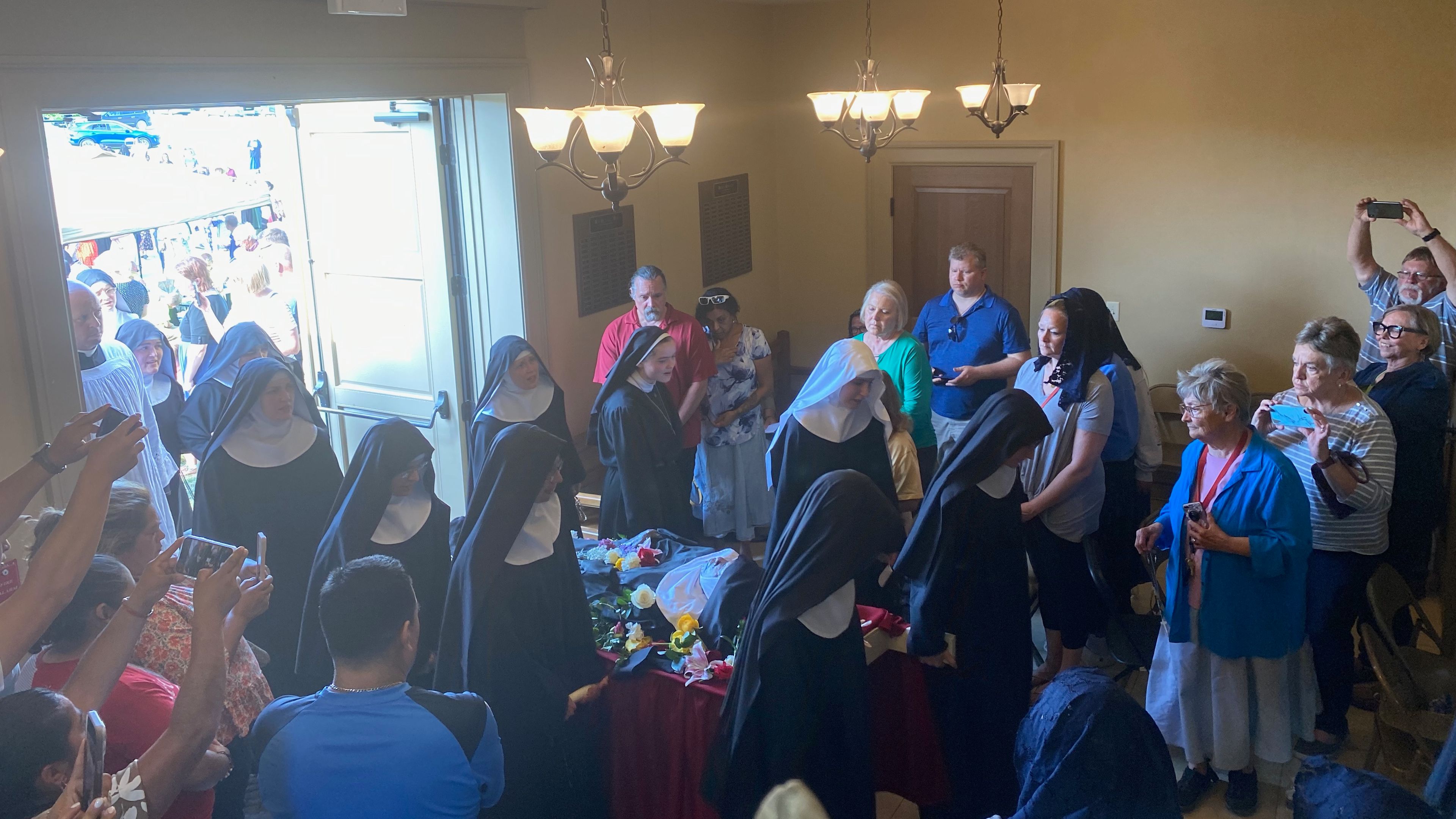 Sister Wilhelmina’s body placed in glass case after solemn rosary ...