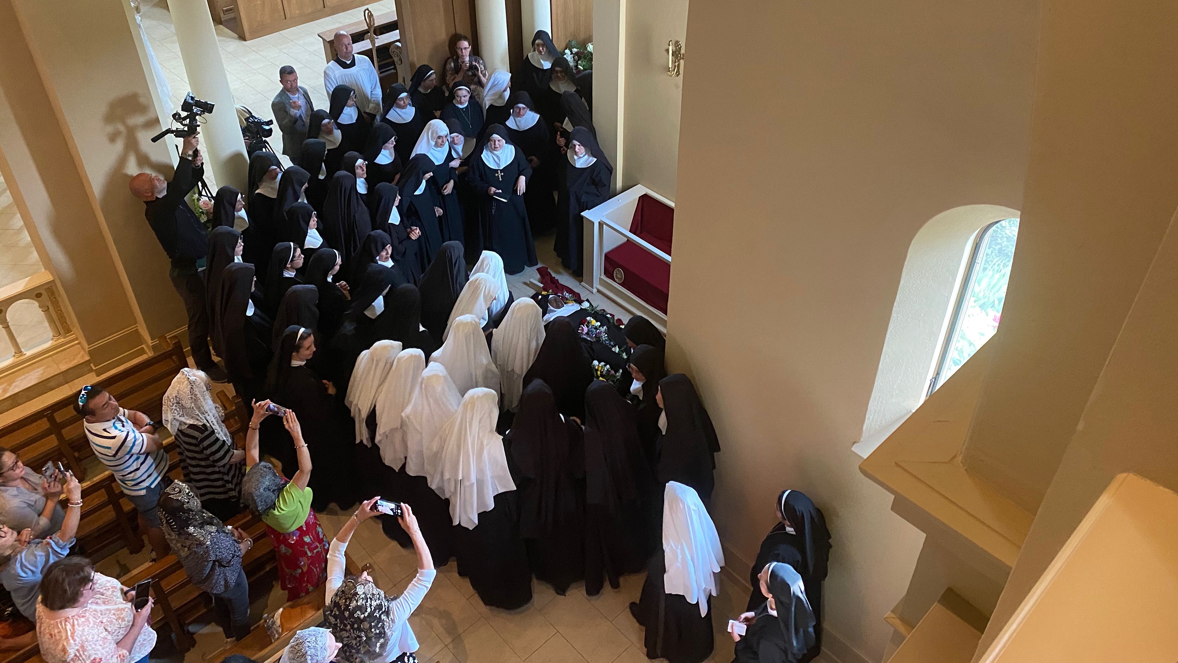 Sister Wilhelmina’s body placed in glass case after solemn rosary ...