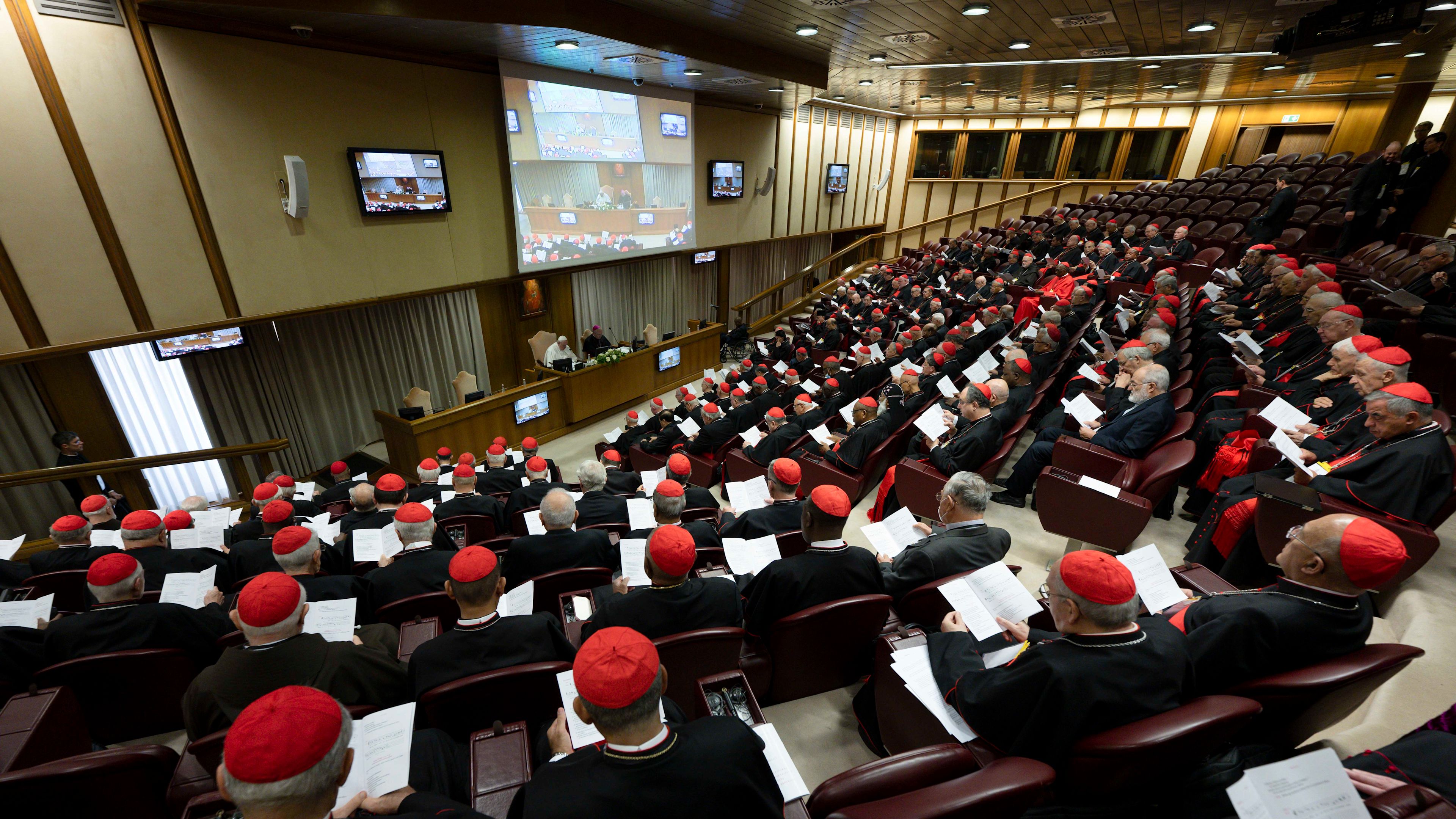 197 cardinals meet behind closed doors — but what is being discussed?