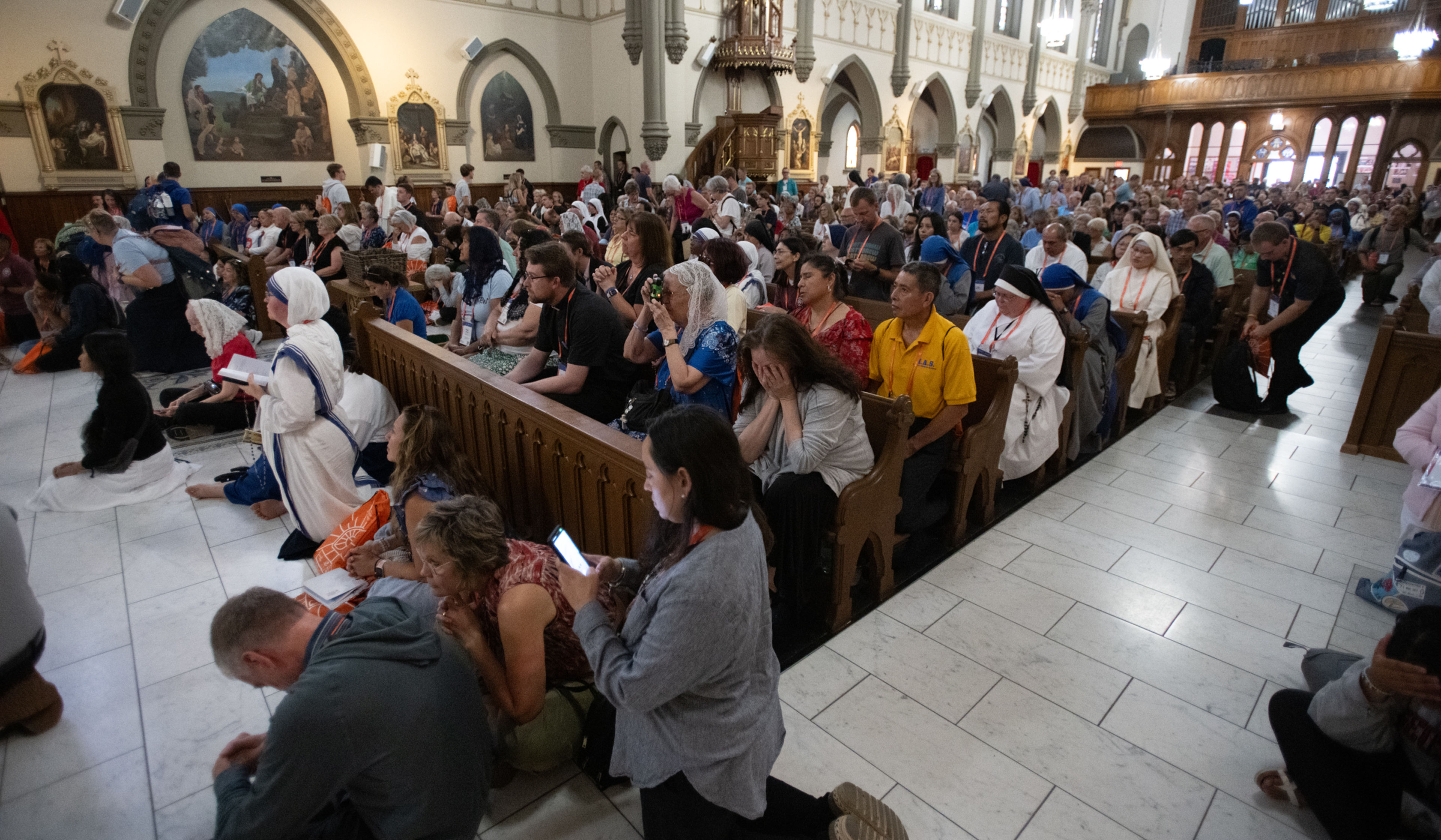 Packed adoration chapel at National Eucharistic Congress overflows with devotion to Jesus