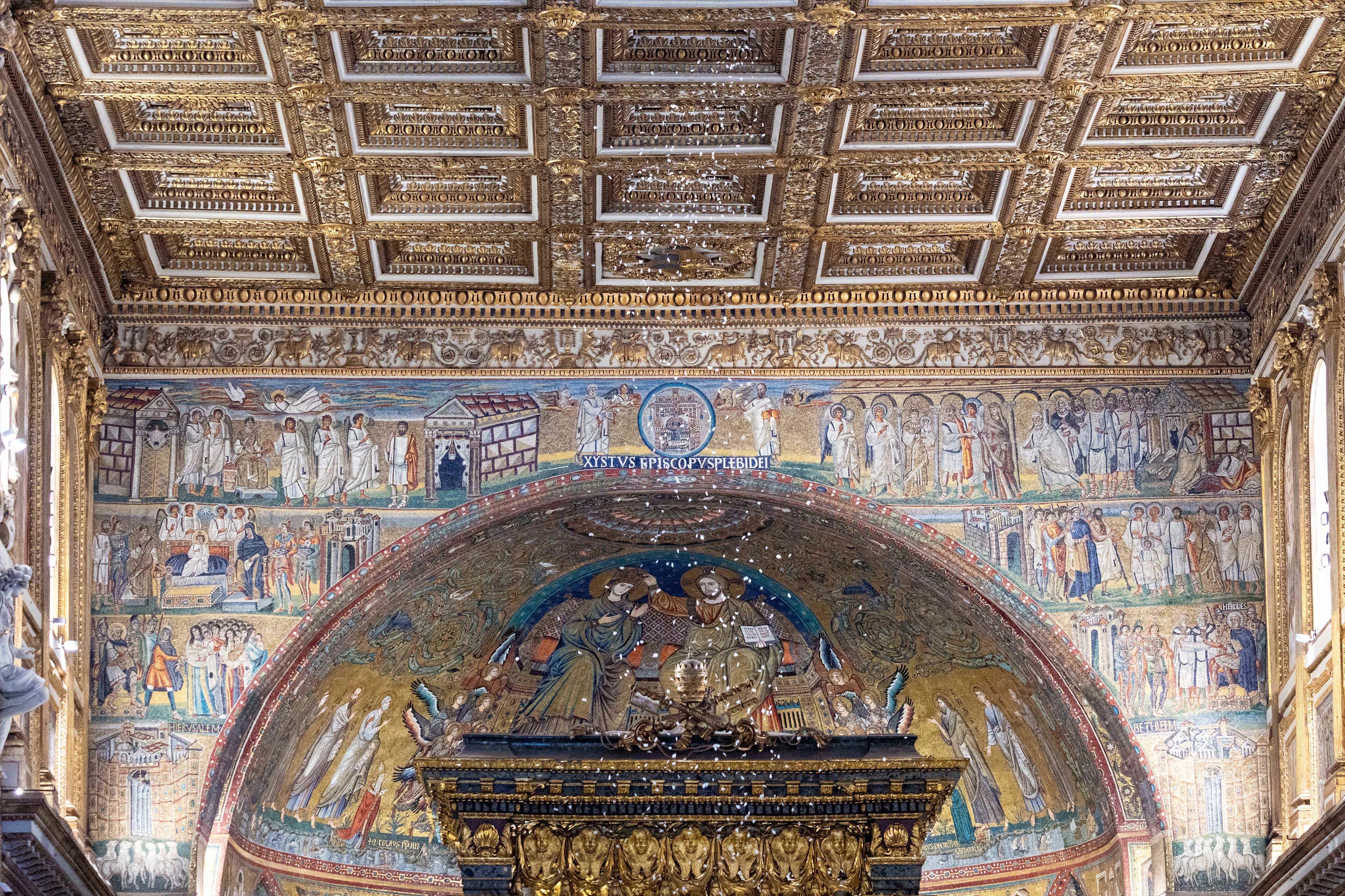 PHOTOS: White rose petals fall from ceiling of Rome basilica to mark ...