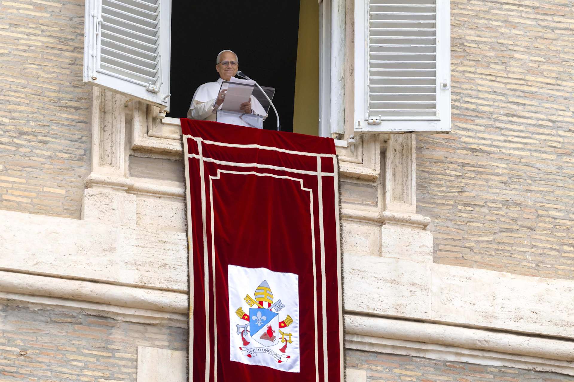 Pope Leo XIV speaks from a window of the Apostolic Palace overlooking St. Peter’s Square during the Sunday Angelus on Aug. 24, 2025. | Credit: Vatican Media null