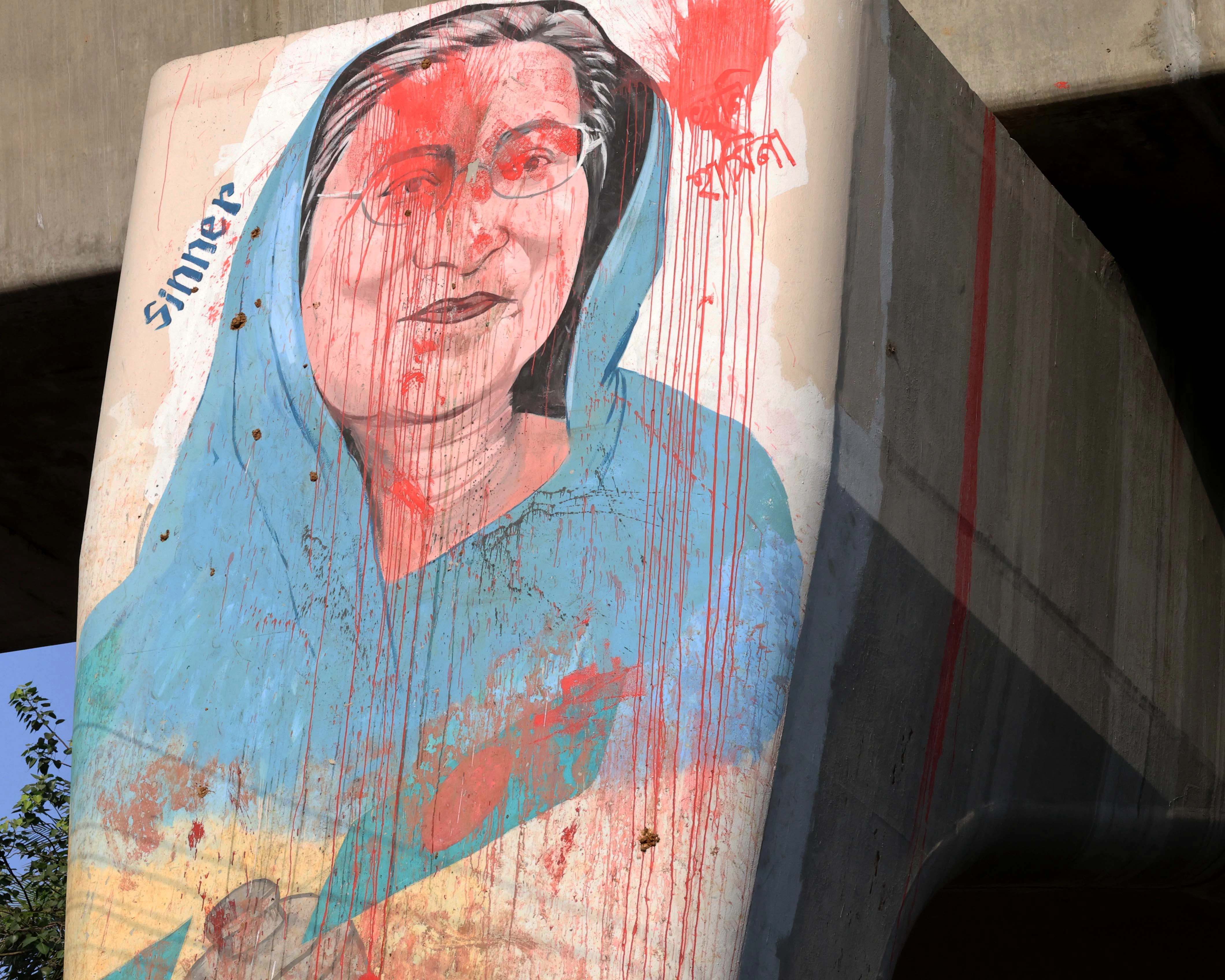 A satirical caricature of former Prime Minister Sheikh Hasina, drawn by students on the eve of the 2024 student uprising, can still be seen on the pillars of the Dhaka Metrorail in Bangladesh. Credit: Stephan Uttom Rozario