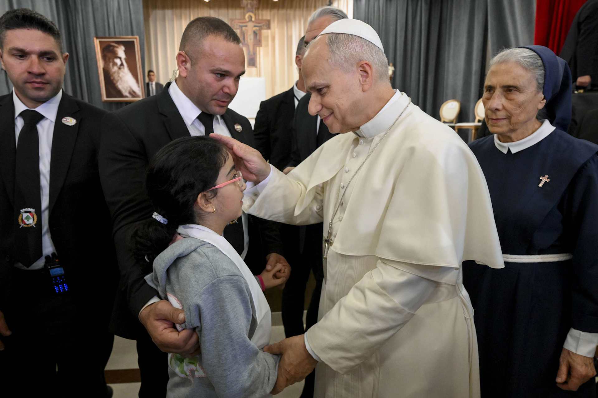 Pope Leo XIV blesses a child at the De La Croix Hospital for the mentally disabled in Jal el Dib, north of Beirut, Lebanon, on Dec. 2, 2025. | Credit: Vatican Media