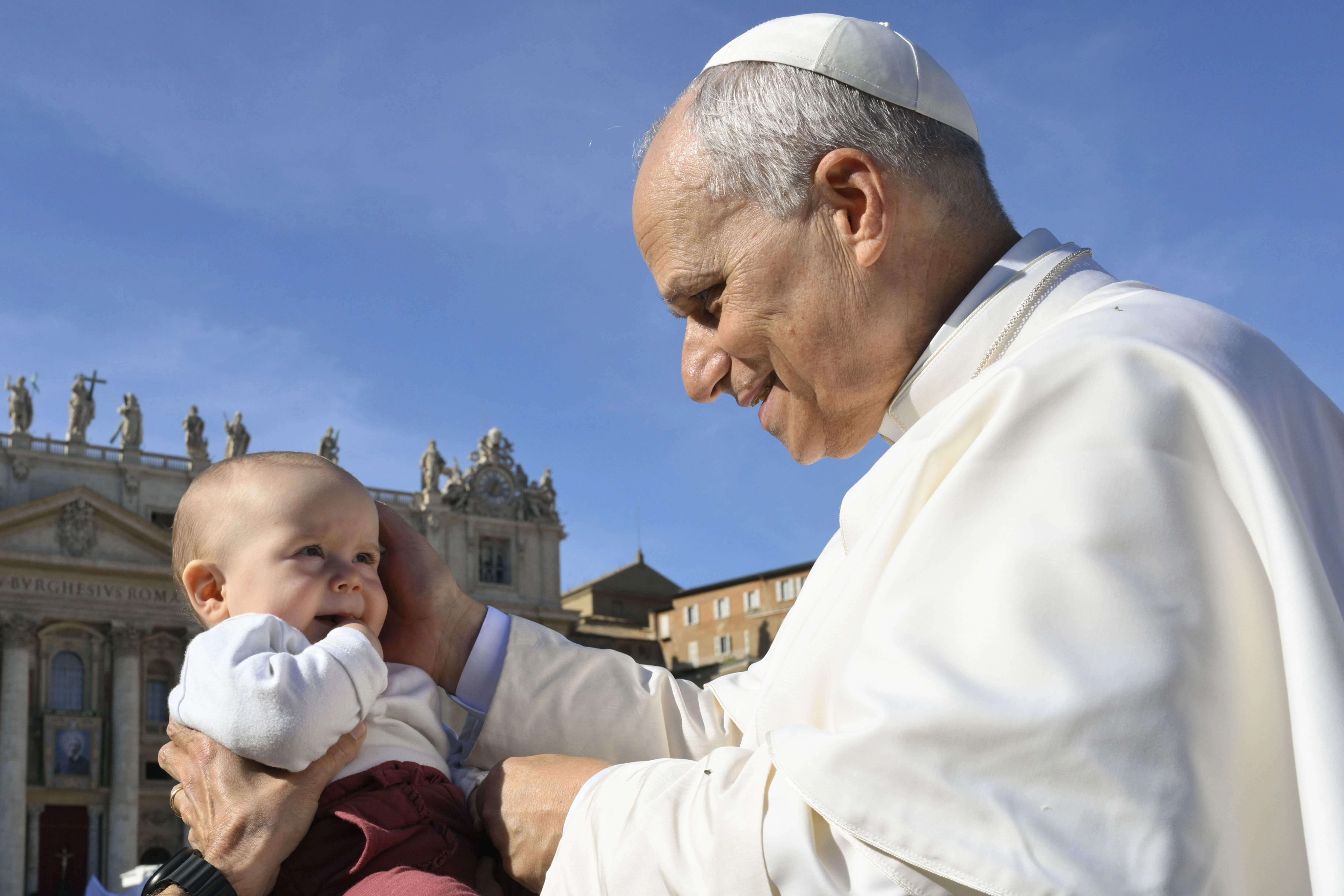 Pope Leo XIV blesses a baby on All Saints Day’ 2025. | Credit: Vatican Media