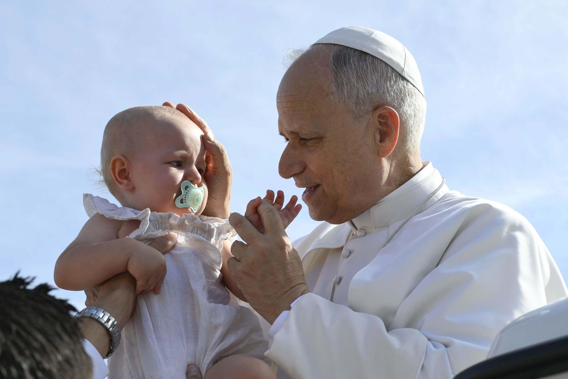 Pope Leo XIV blesses a baby during the general audience on Sept. 3, 2025, in St. Peter’s Square at the Vatican. Credit: Vatican Media