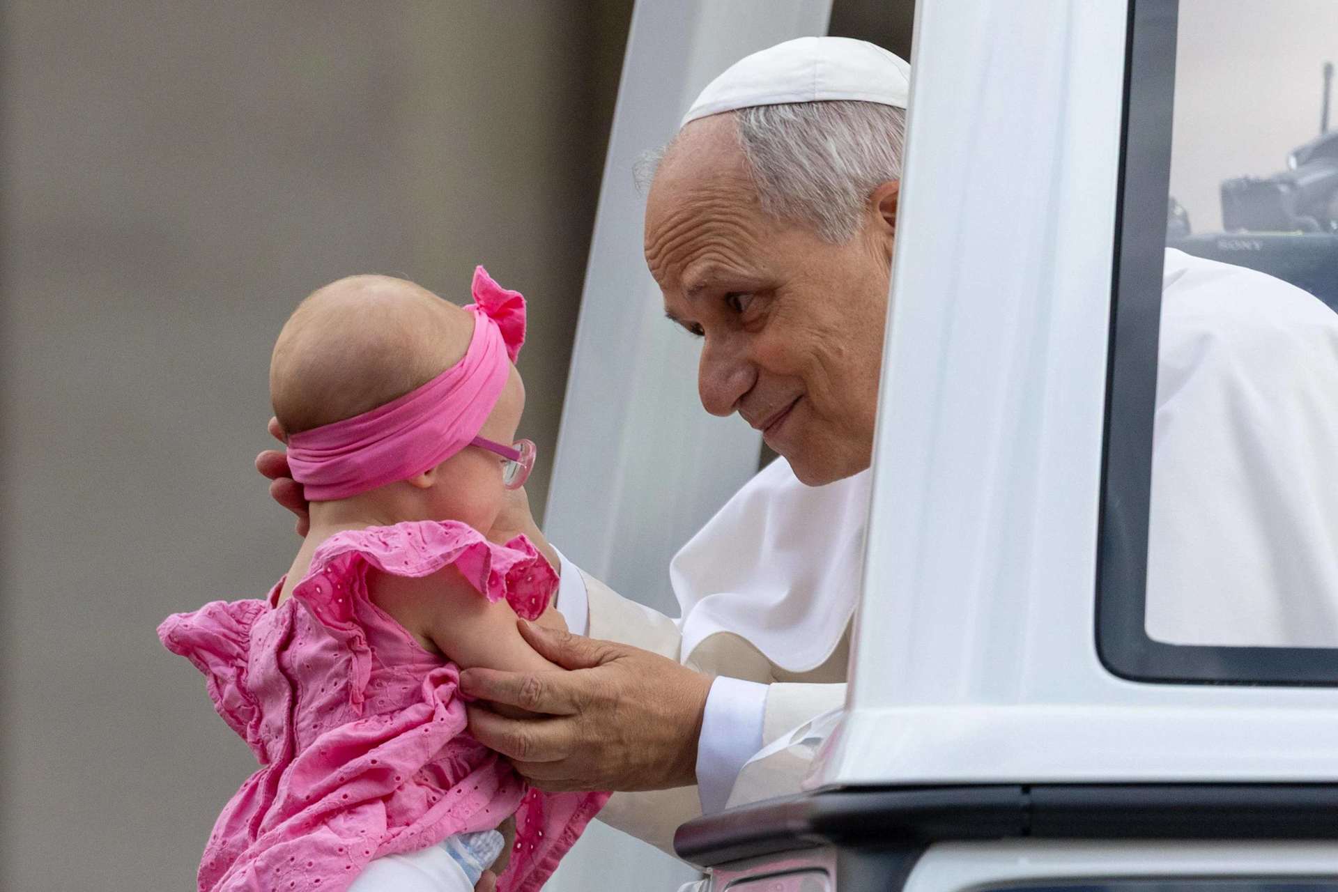 Pope Leo XIV blesses a baby during his general audience on Sept. 24, 2025, in St. Peter’s Square at the Vatican. Credit: Daniel Ibañez/CNA