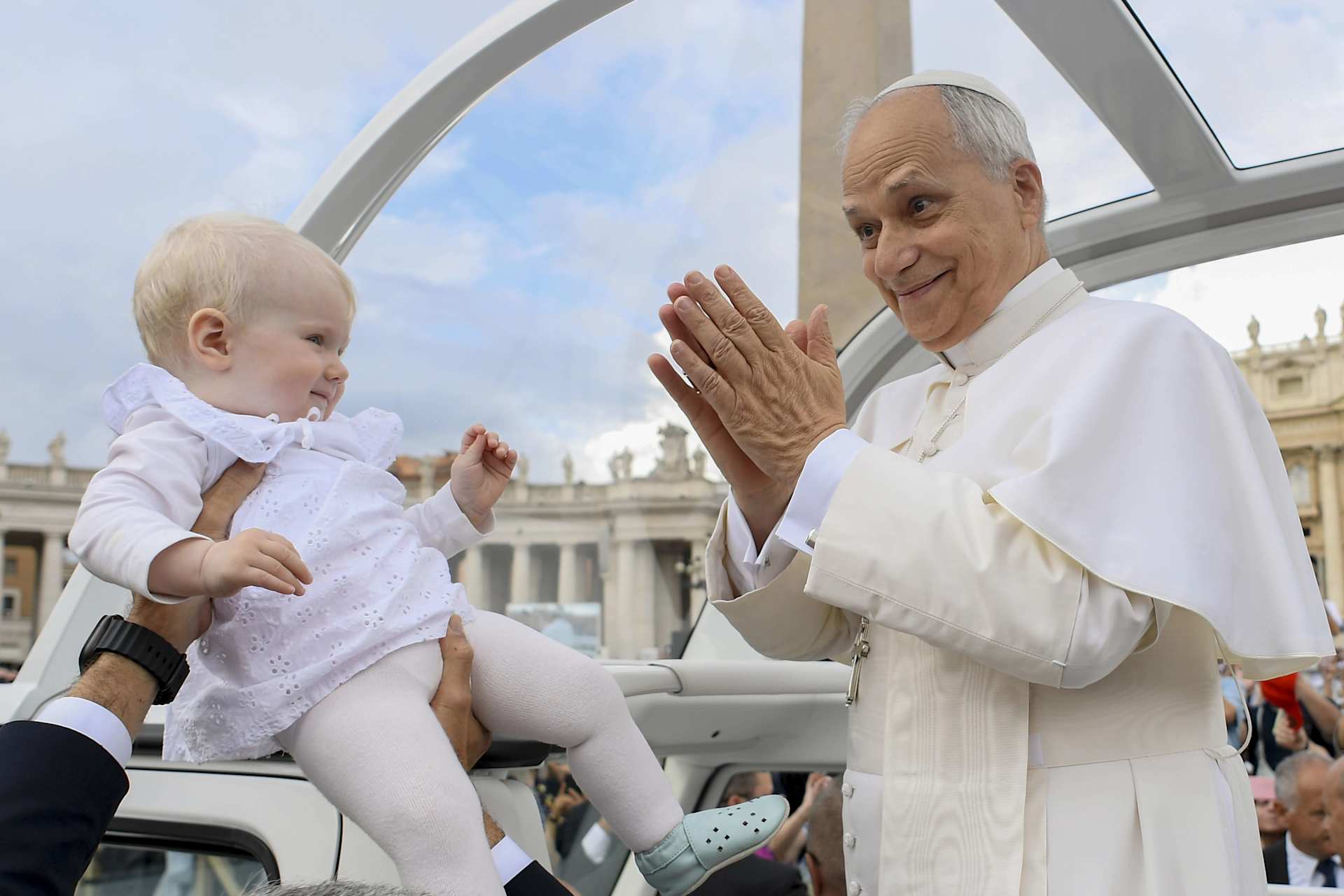 Pope Leo XIV greets a baby during his general audience on Sept. 24, 2025, in St. Peter’s Square at the Vatican. Credit: Vatican Media