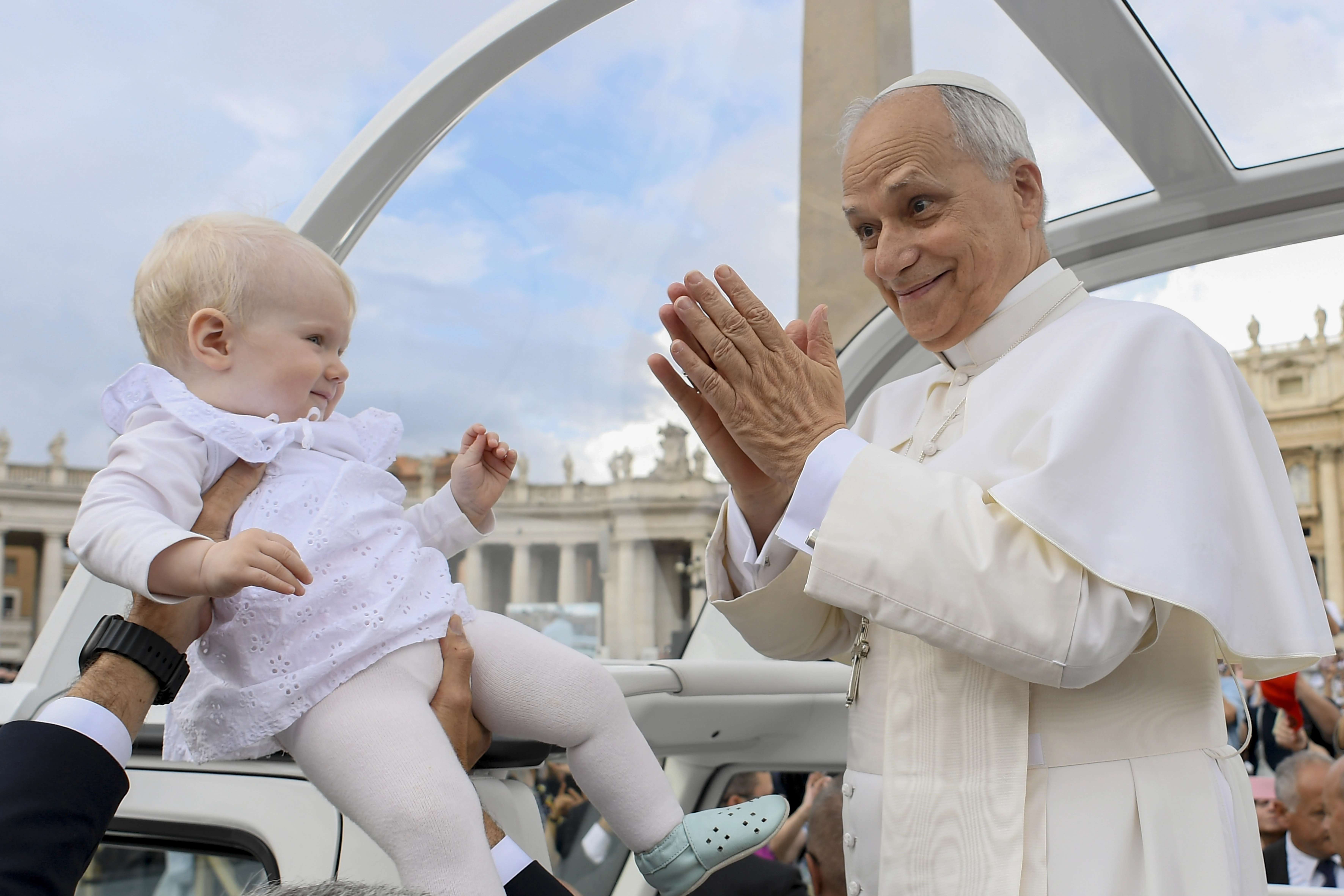 Pope Leo XIV greets a baby during his general audience on Sept. 24, 2025, in St. Peter’s Square at the Vatican. Credit: Vatican Media