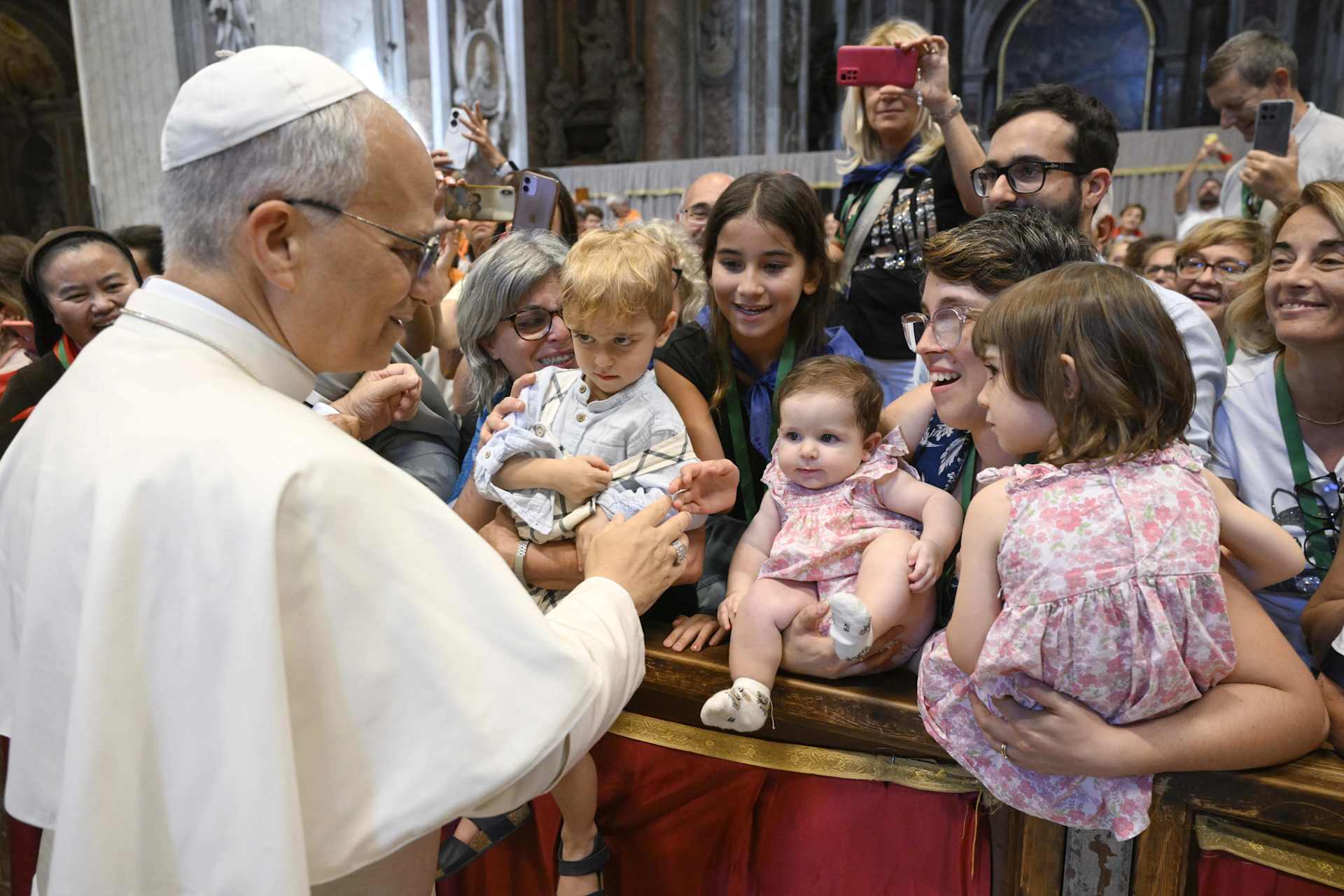 Pope Leo greets young children and families in St. Peter's Basilica Credit: Vatican Media