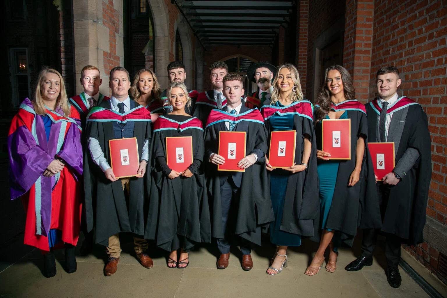 Graduates pose with their degrees at St. Mary’s University College in Belfast, Northern Ireland. | Credit: St. Mary’s University College?w=200&h=150