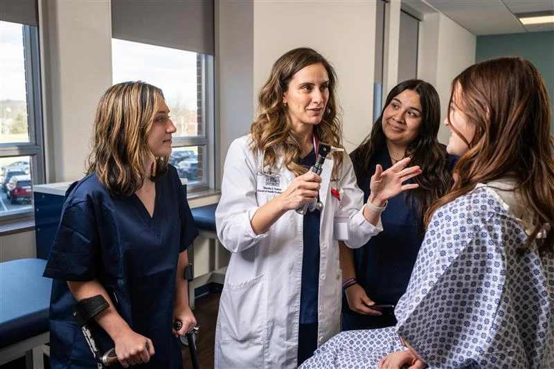Associate Program Director Leanne Hedges, MMS, PA-C, demonstrates a comprehensive physical examination as part of clinical training for PA students. Credit: Photo courtesy of Mount St. Mary's University