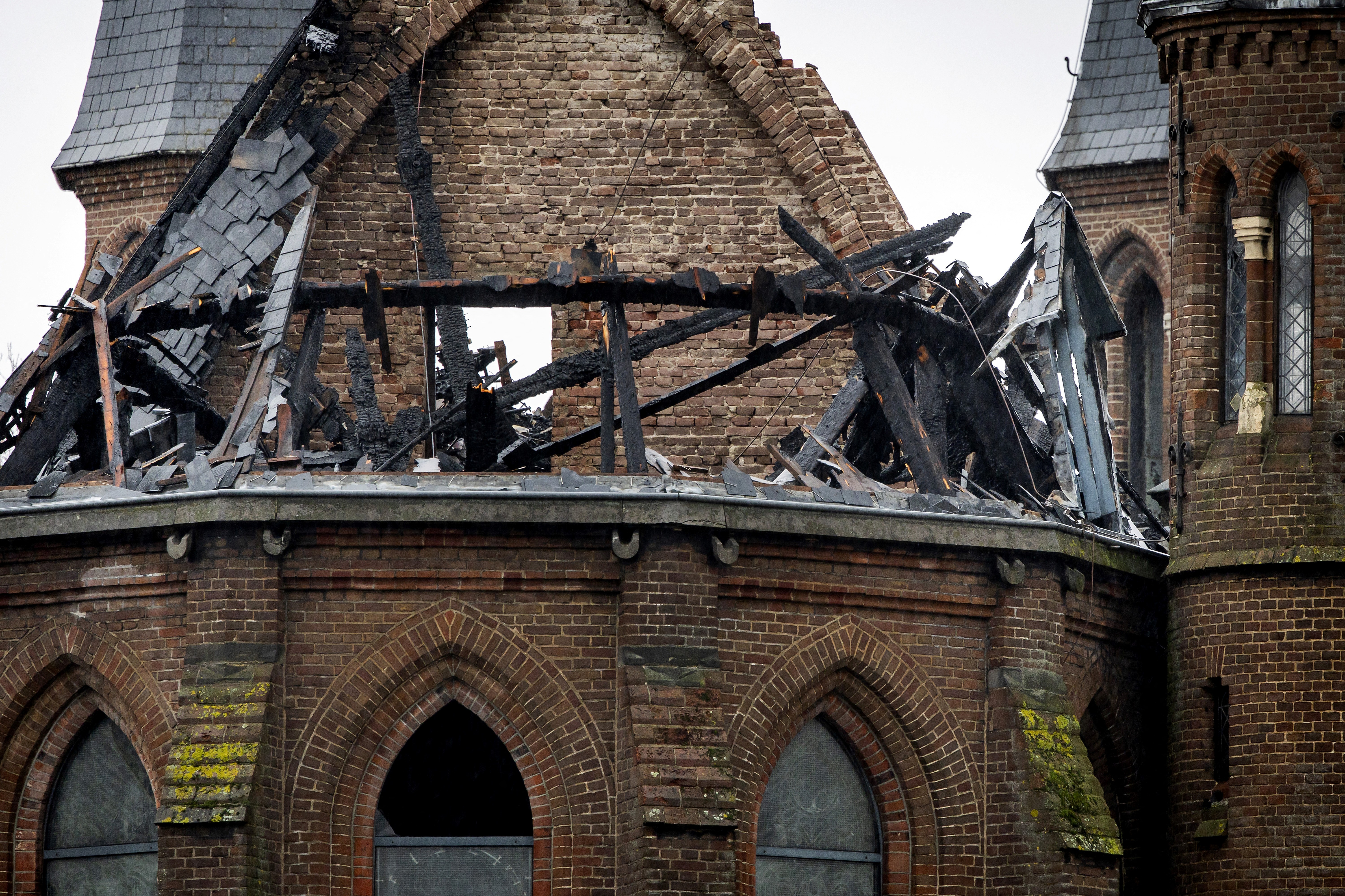 The burned walls of the Vondelkerk are seen in Amsterdam, Thursday, Jan. 1, 2026. | Credit: KOEN VAN WEEL/Getty Images
