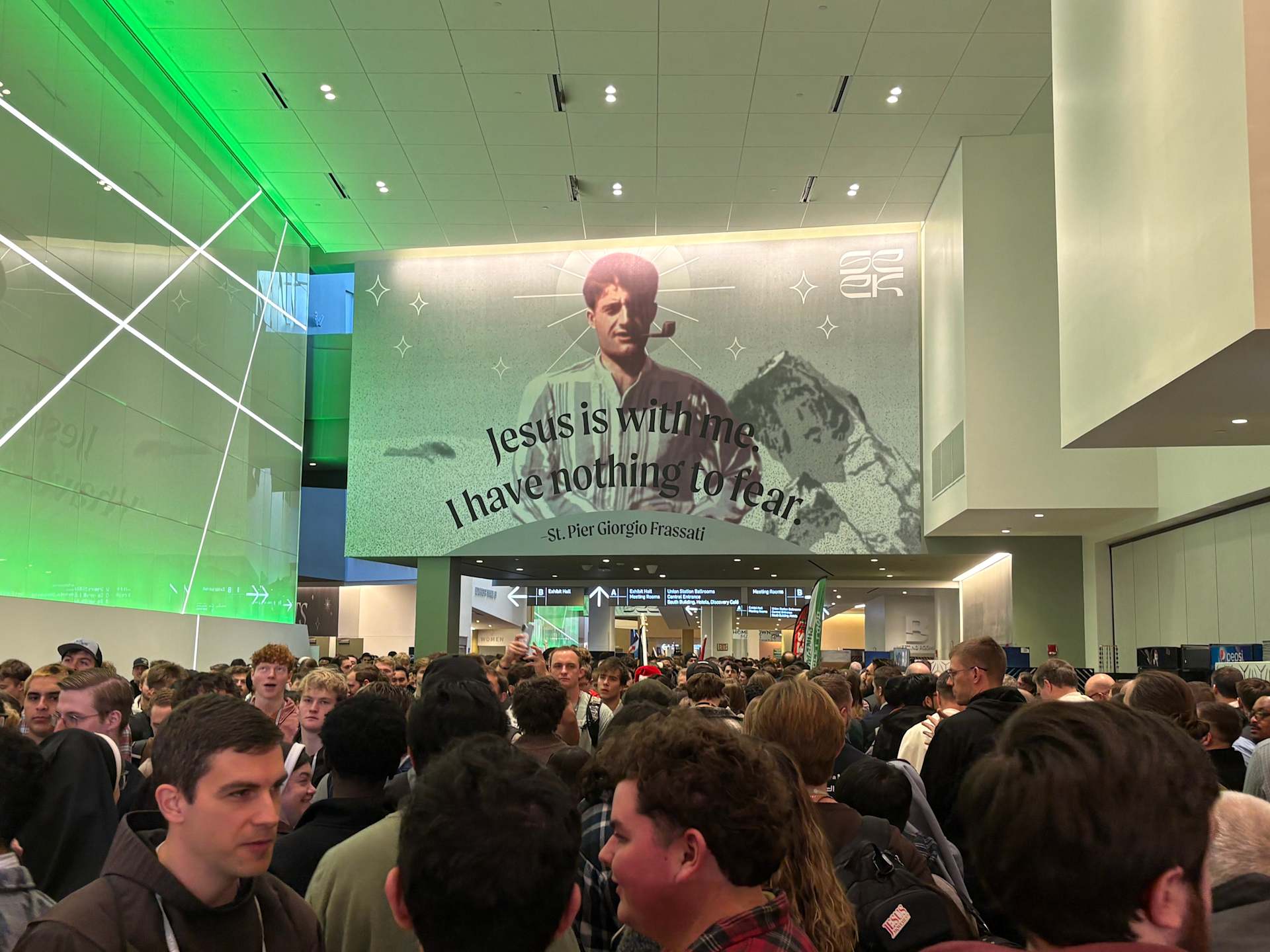 Crowds gather at SEEK 2026 beneath a photo of St. Pier Giorgio Frassati in Columbus, Ohio, on Friday, Jan. 2, 2026. | Credit: Gigi Duncan/EWTN News