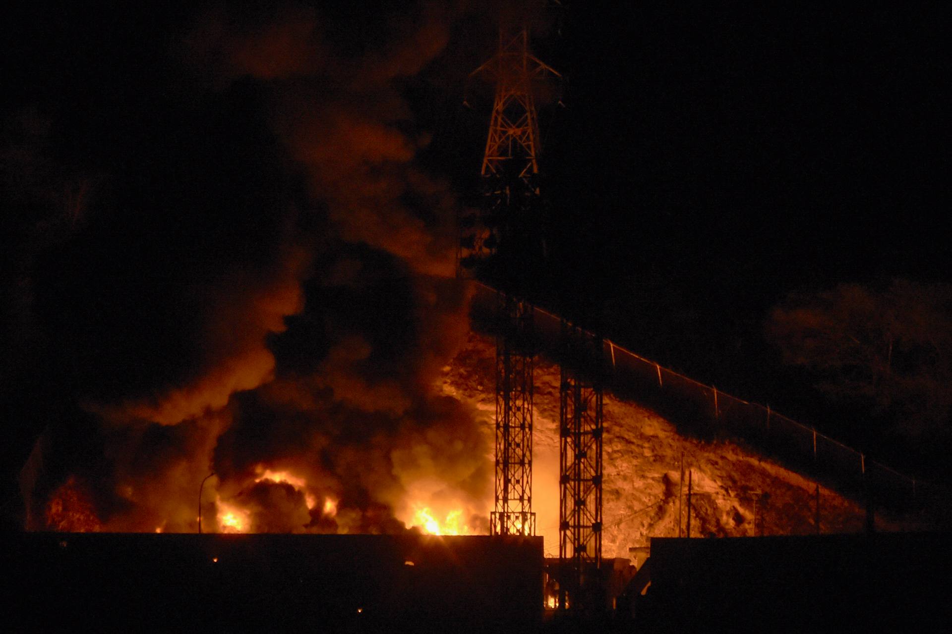 Fire burns in Caracas, Venezuela, after a U.S.-led strike and the capture of President Nicolás Maduro, Saturday, Jan. 3, 2026. Credit: LUIS JAIMES / Getty