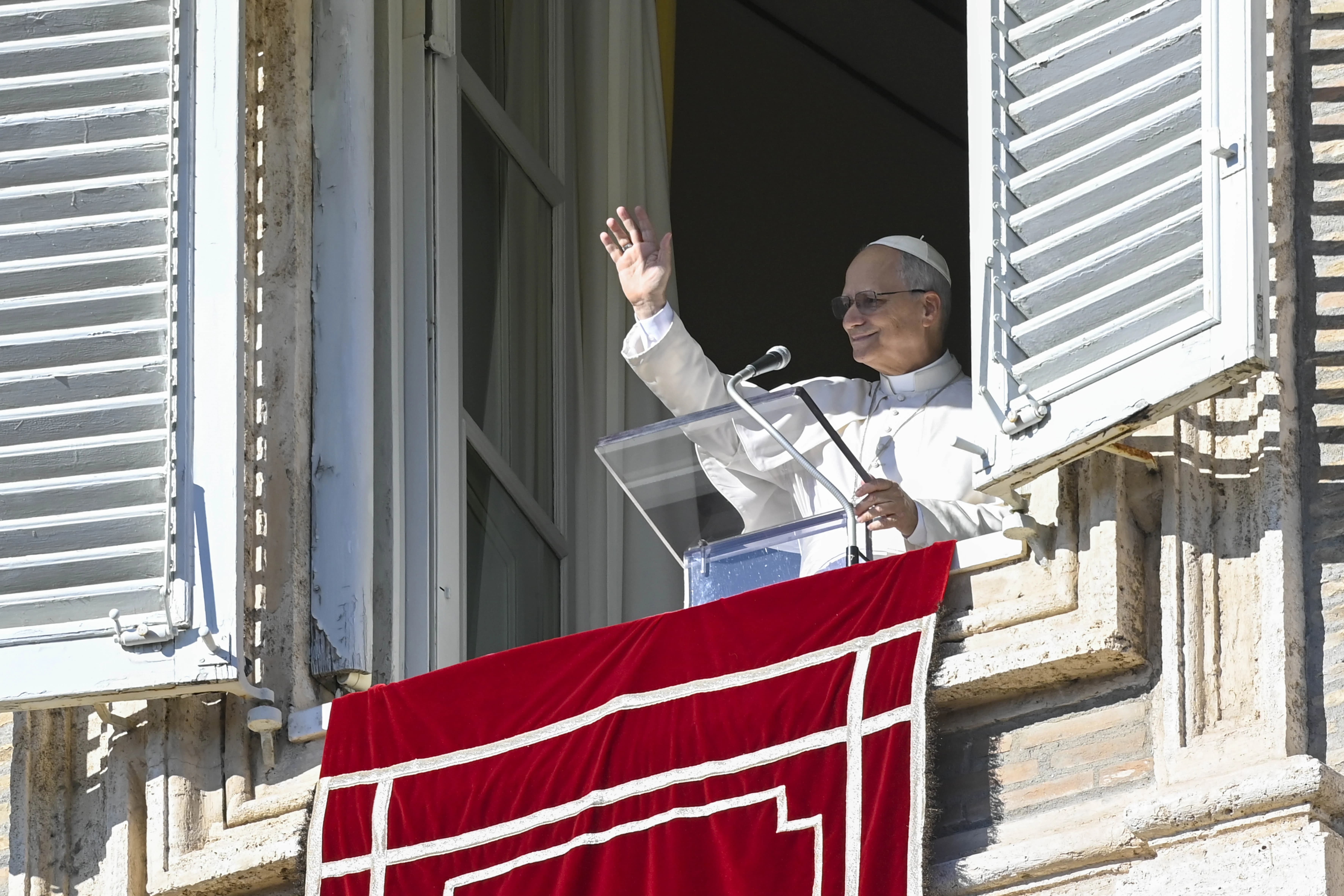 Pope Leo XIV greets pilgrims gathered in St. Peter's Square at the Vatican for the recitation of the Angelus on Jan. 11, 2026. | Vatican Media