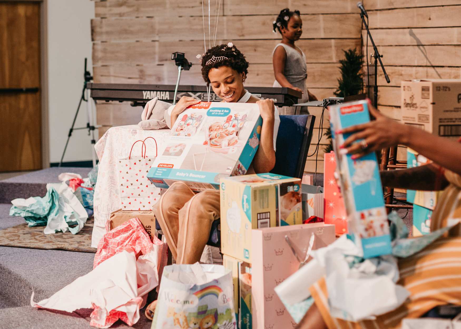 A woman receives a baby shower at her local church through Embrace Grace. | Credit: Embrace Grace