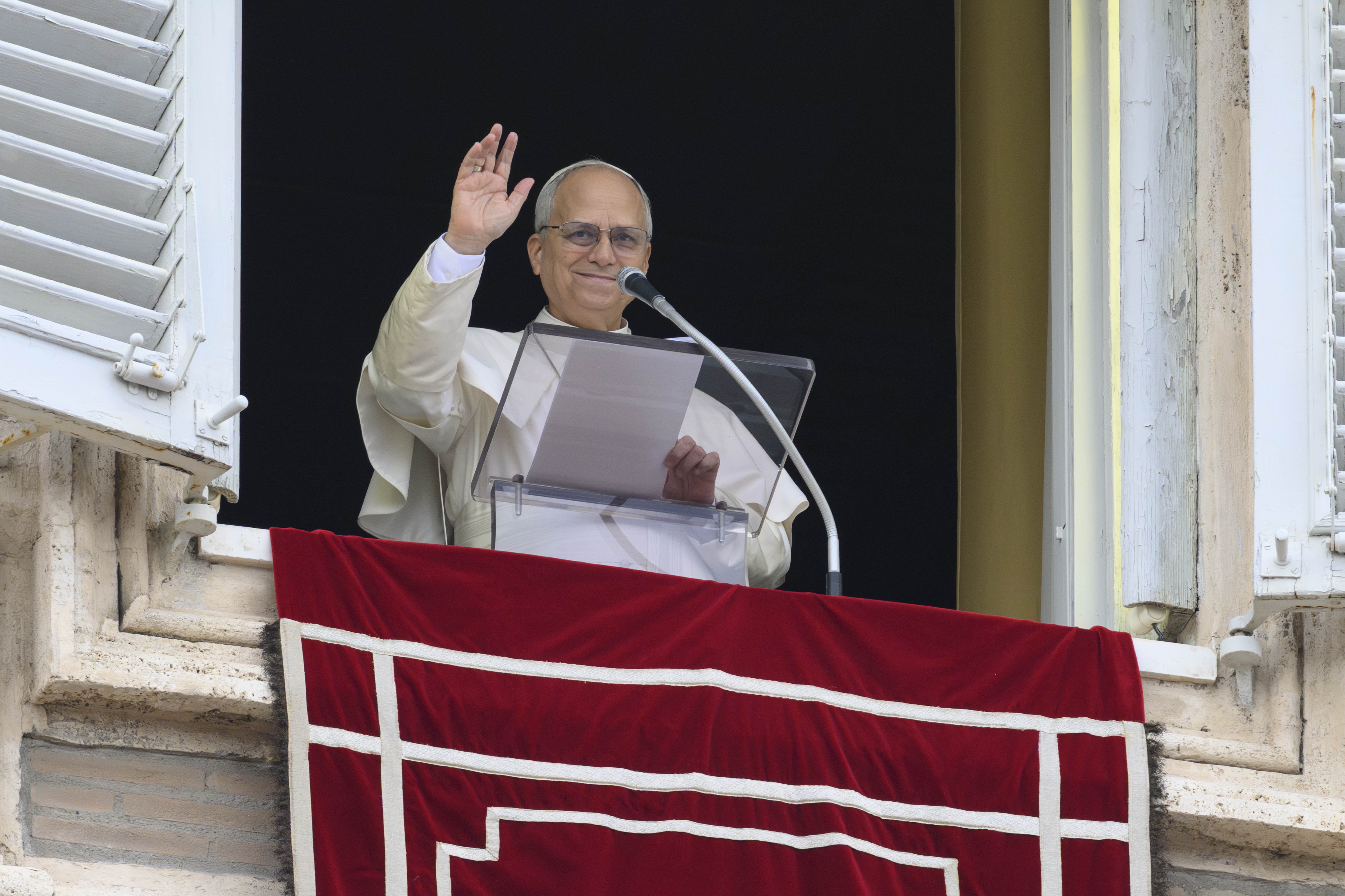 Pope Leo XIV waves to crowds in St. Peter's Square after praying the Angelus on Jan. 18, 2026. | Credit: Vatican Media