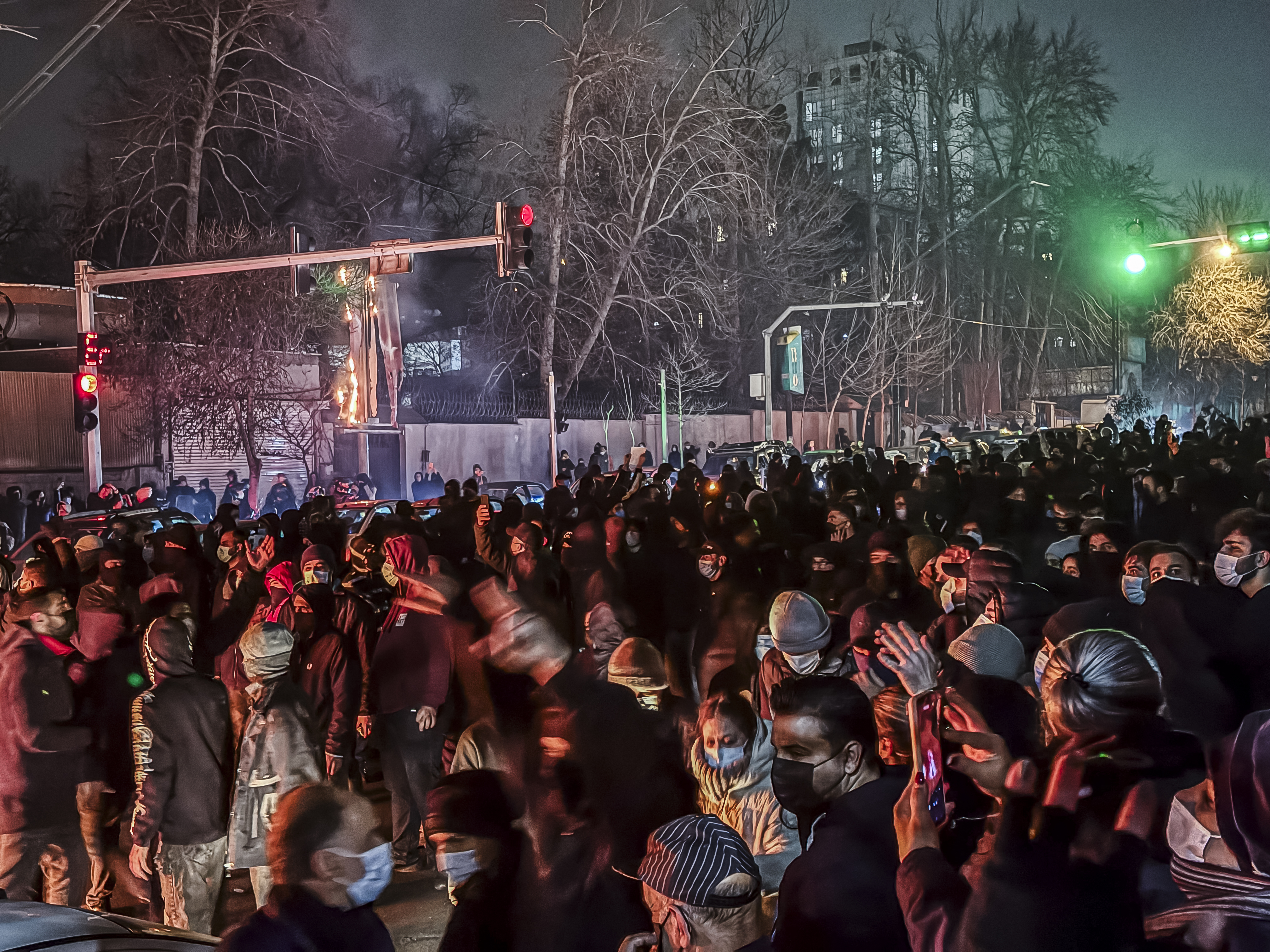 Iranians gather while blocking a street during a protest in Tehran, Iran, on Jan. 9, 2026. The nationwide protests started in Tehran’s Grand Bazaar against the failing economic policies in late December 2025, which spread to universities and other cities, and included economic, political, and anti-government slogans. | Credit: MAHSA/Middle East Images/AFP via Getty Images
