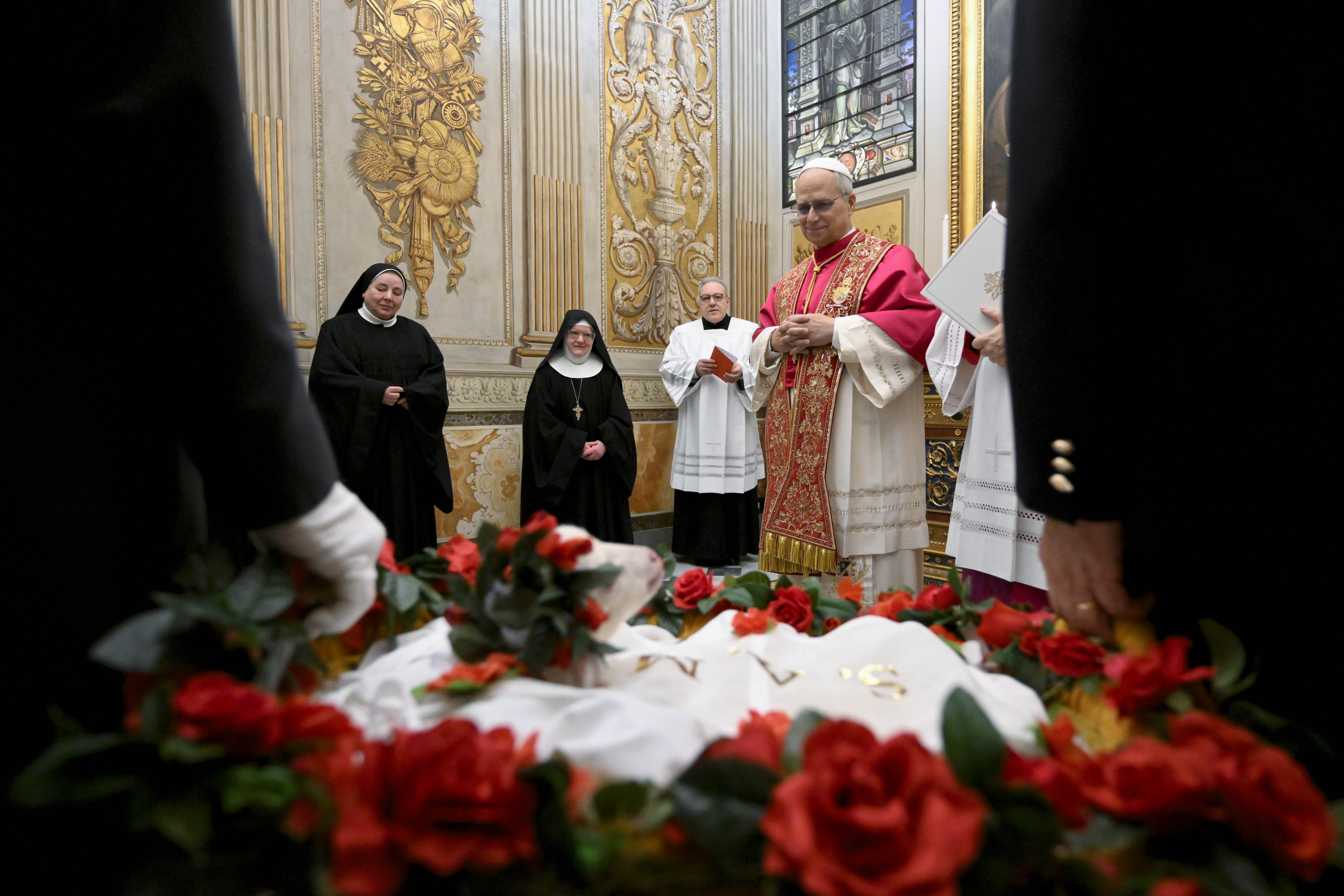 Pope Leo XIV meets a pair of lambs blessed for the feast of the Roman virgin and martyr St. Agnes in the Urban VIII Chapel in the Vatican’s Apostolic Palace on Jan. 21, 2026. | Credit: Vatican Media
