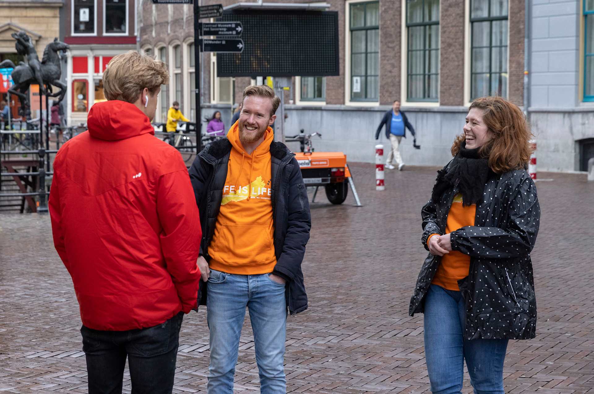 ProLife Europe volunteers Hendrik and Arianne engage in conversation with passersby during a street outreach in Utrecht, Netherlands. | Credit: ProLife Europe