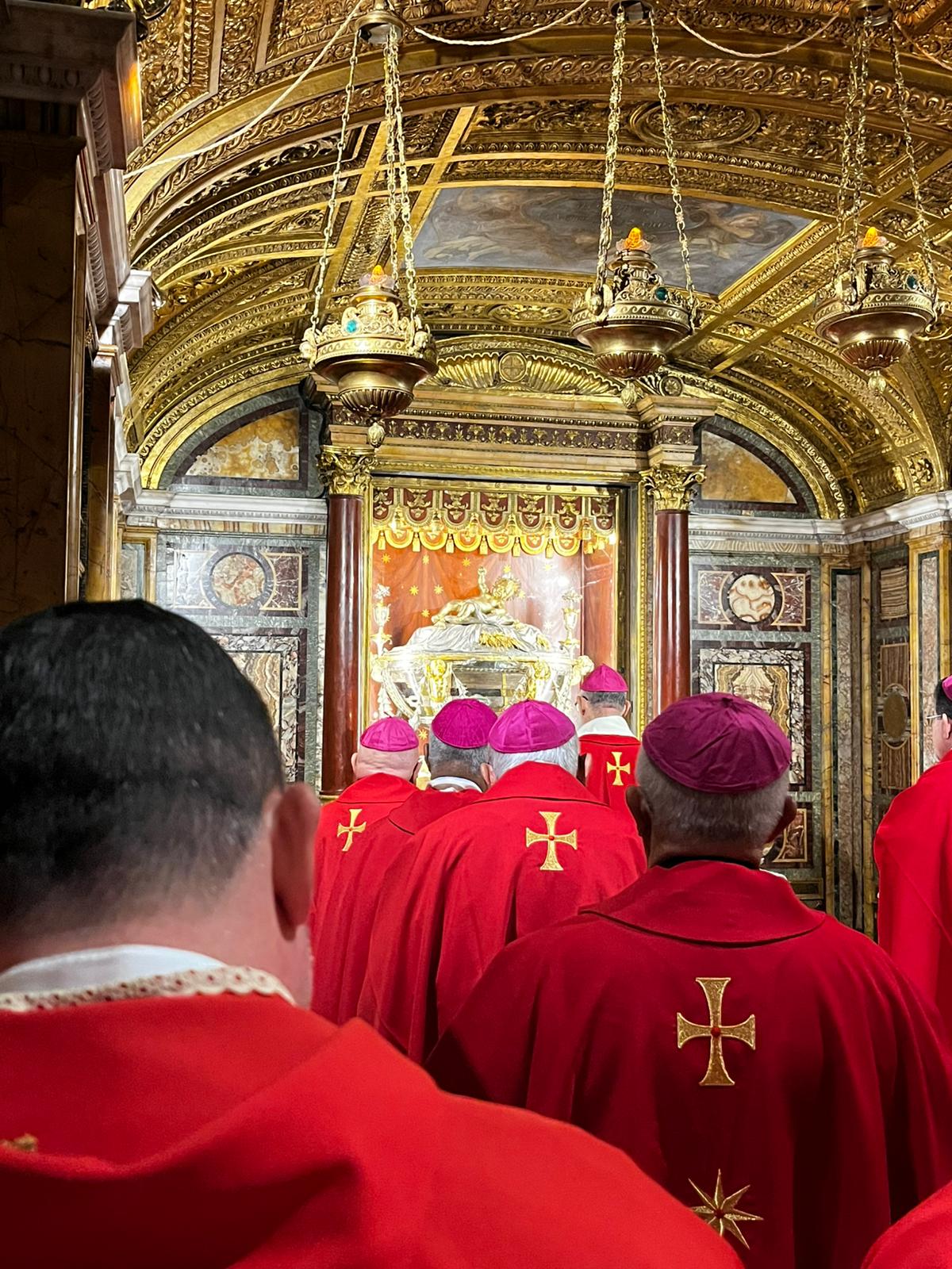 Bishops pray before the tomb of St. Peter during their ad limina visit. | Credit: Father Miguel Silvestre