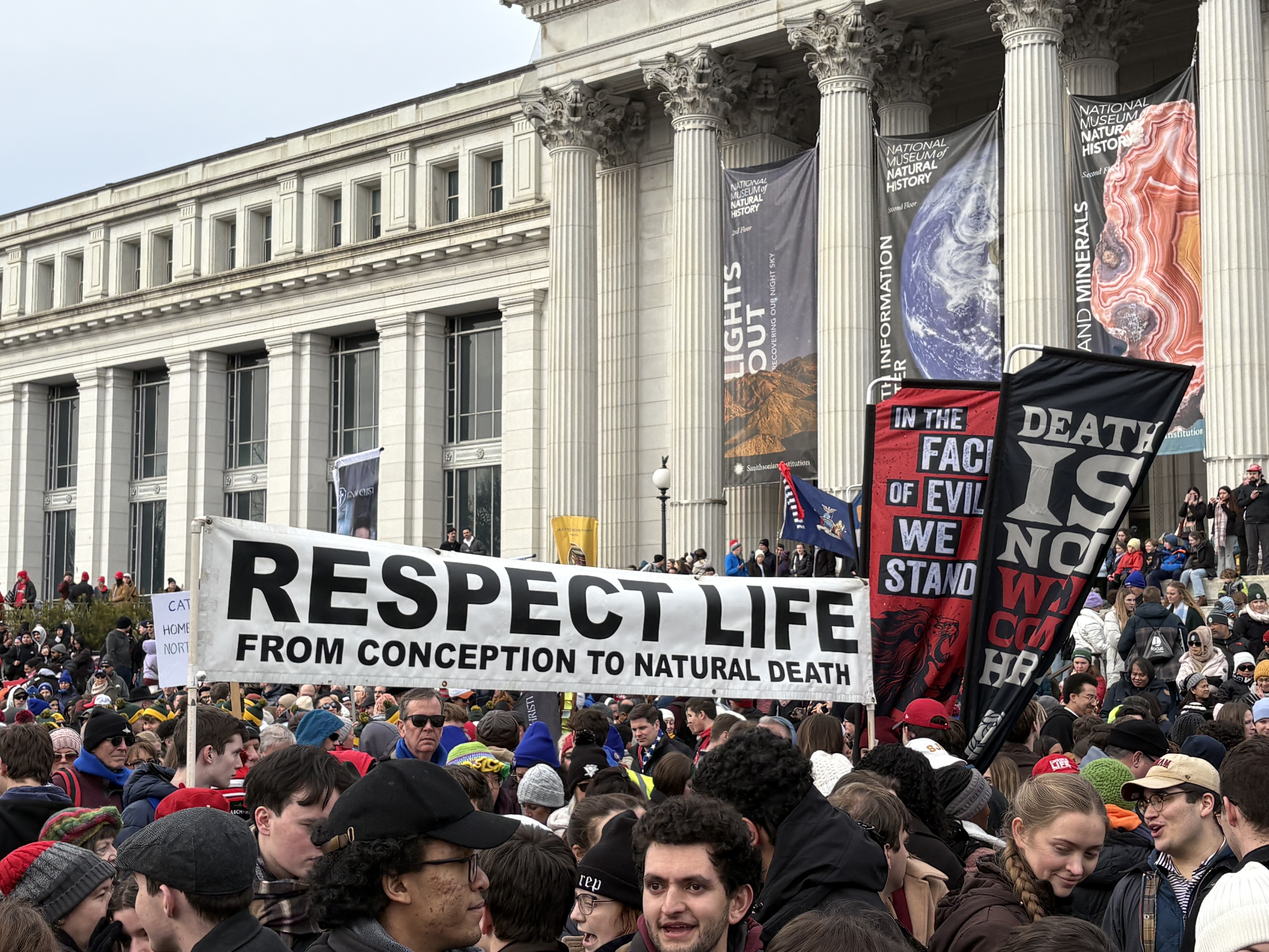 A group holds a banner to protect the dignity of humans at all stages of life at the March for Life on Jan. 23, 2026. | Credit: Tessa Gervasini/EWTN News
