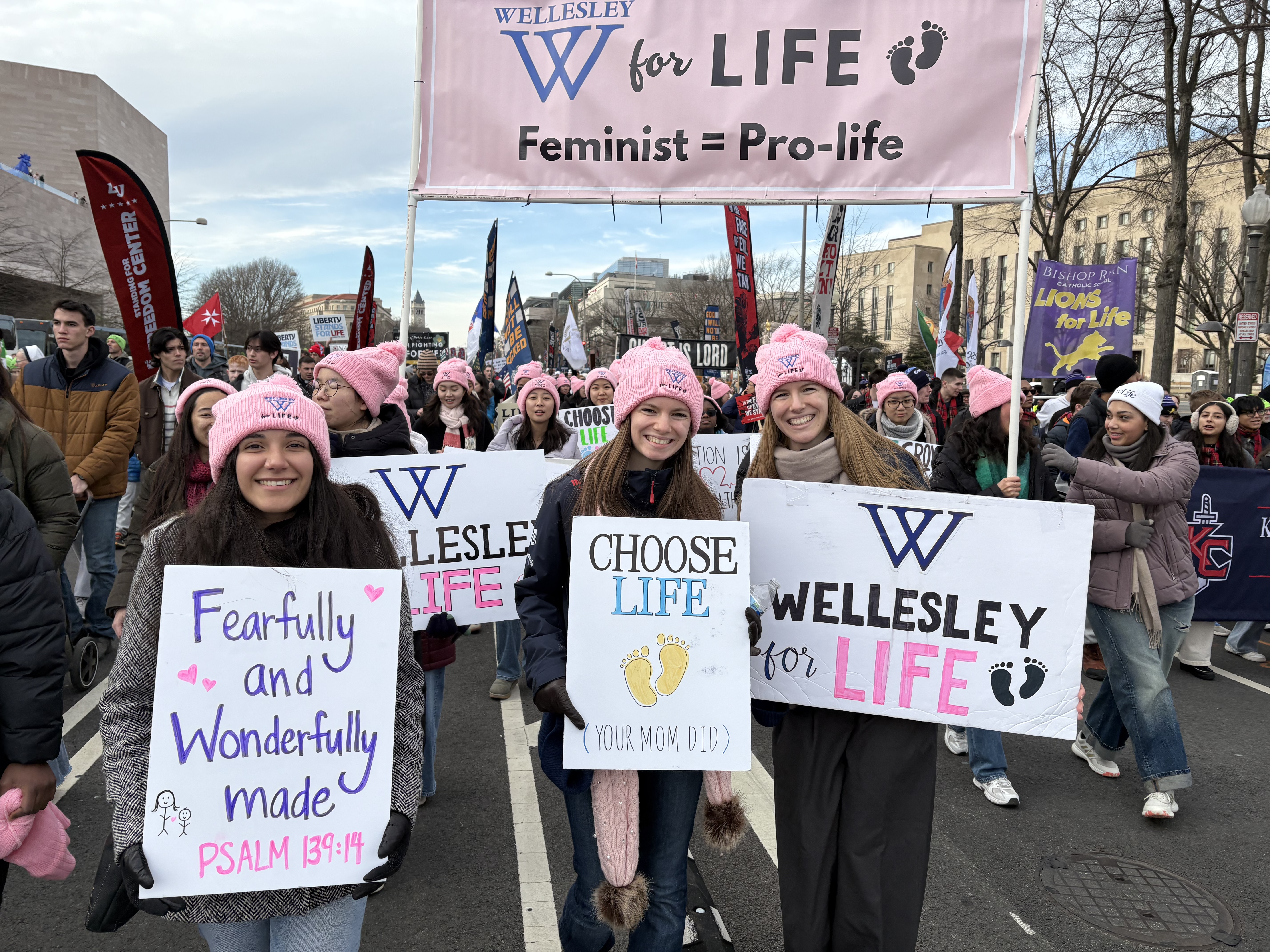 Wellesley students hold their pro-life feminism-inspired signs as they march at the March for Life on Jan. 23, 2026. | Credit: Tessa Gervasini/EWTN News