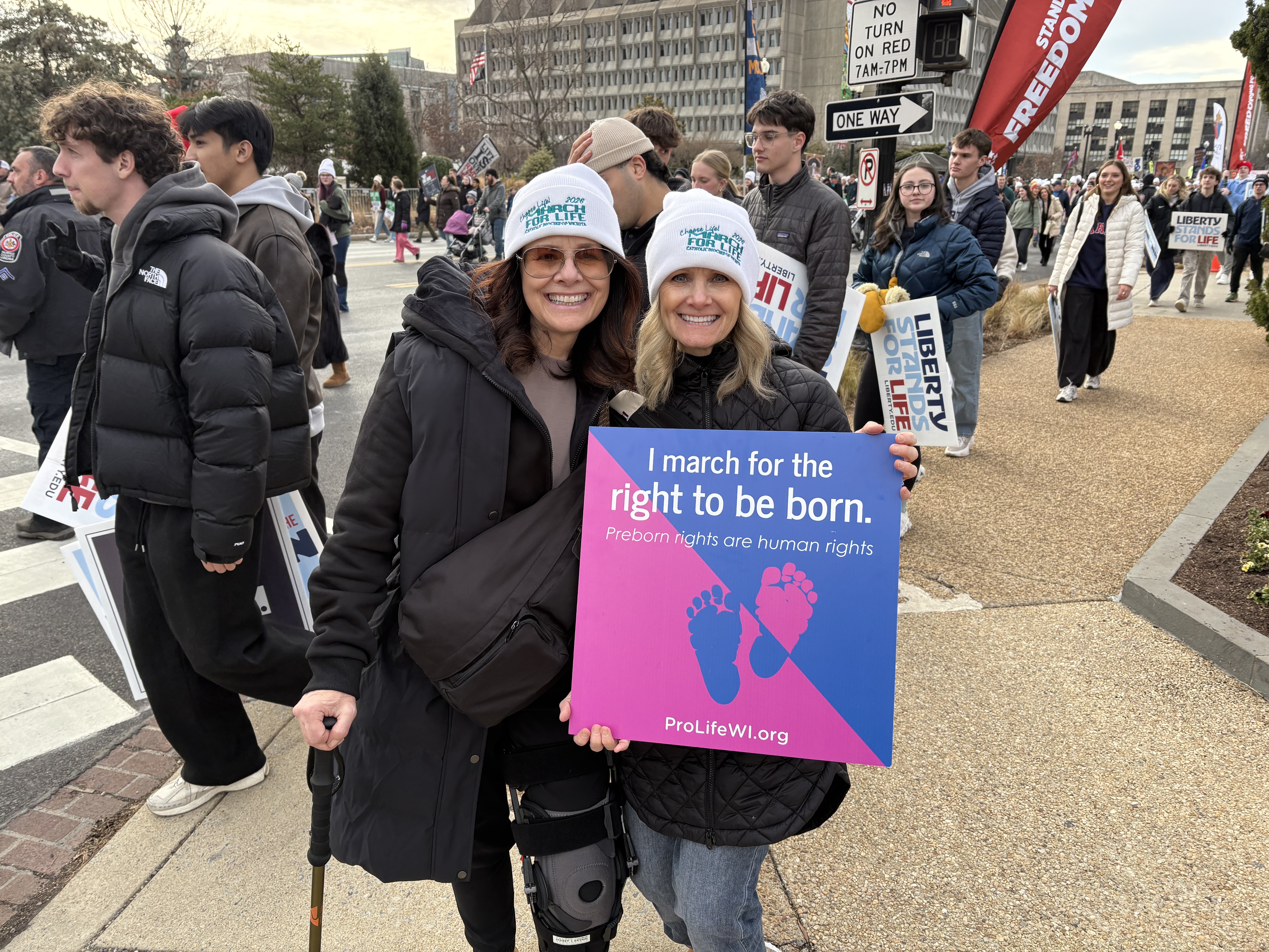 Sisters who traveled 23 hours for the March for Life hold their signs on Jan. 23, 2026. | Credit: Tessa Gervasini/EWTN News
