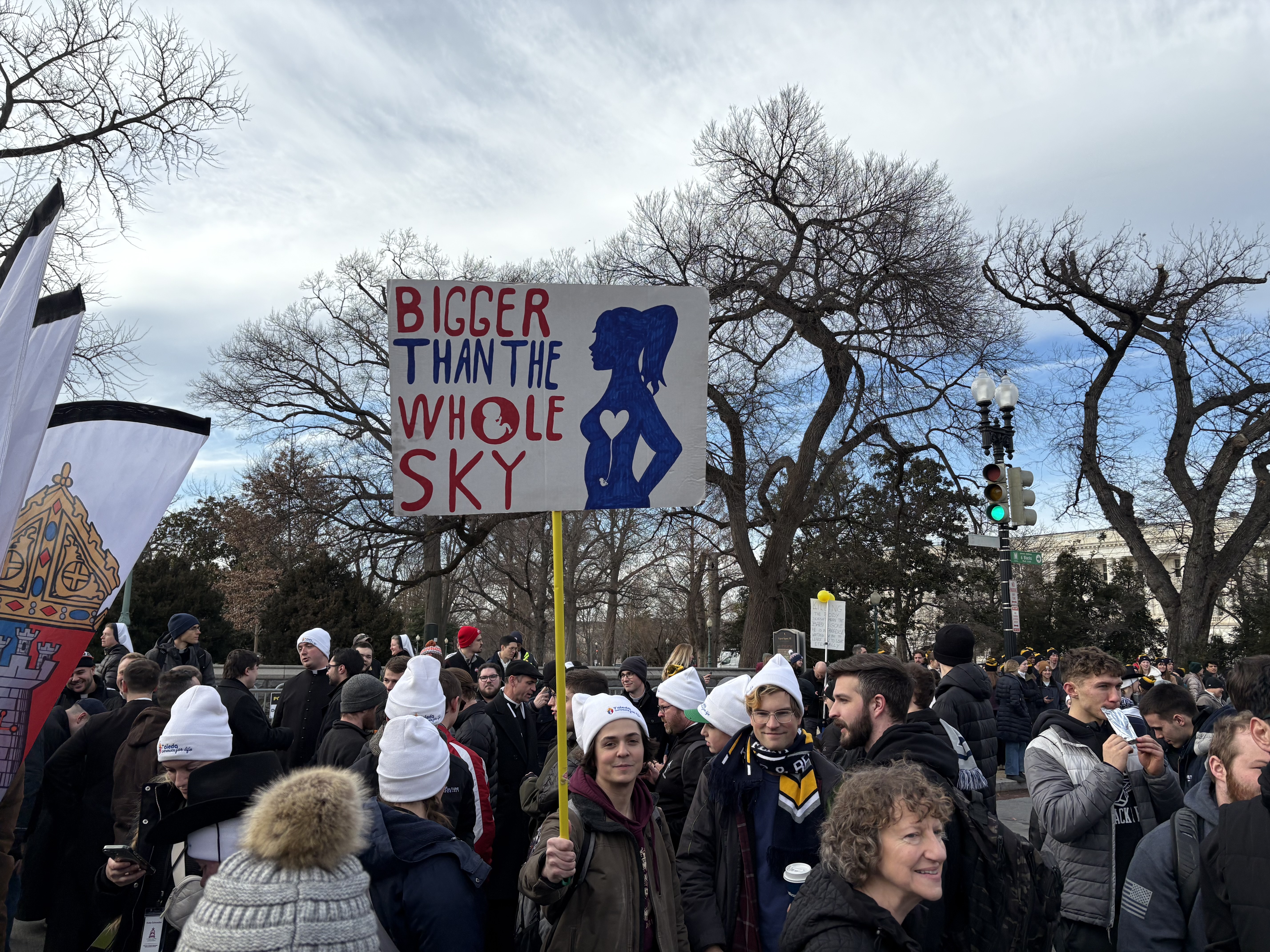 A group from the Diocese of Toledo holds their “bigger than the whole sky” sign at the March for Life on Jan. 23, 2026. | Credit: Tessa Gervasini/EWTN News