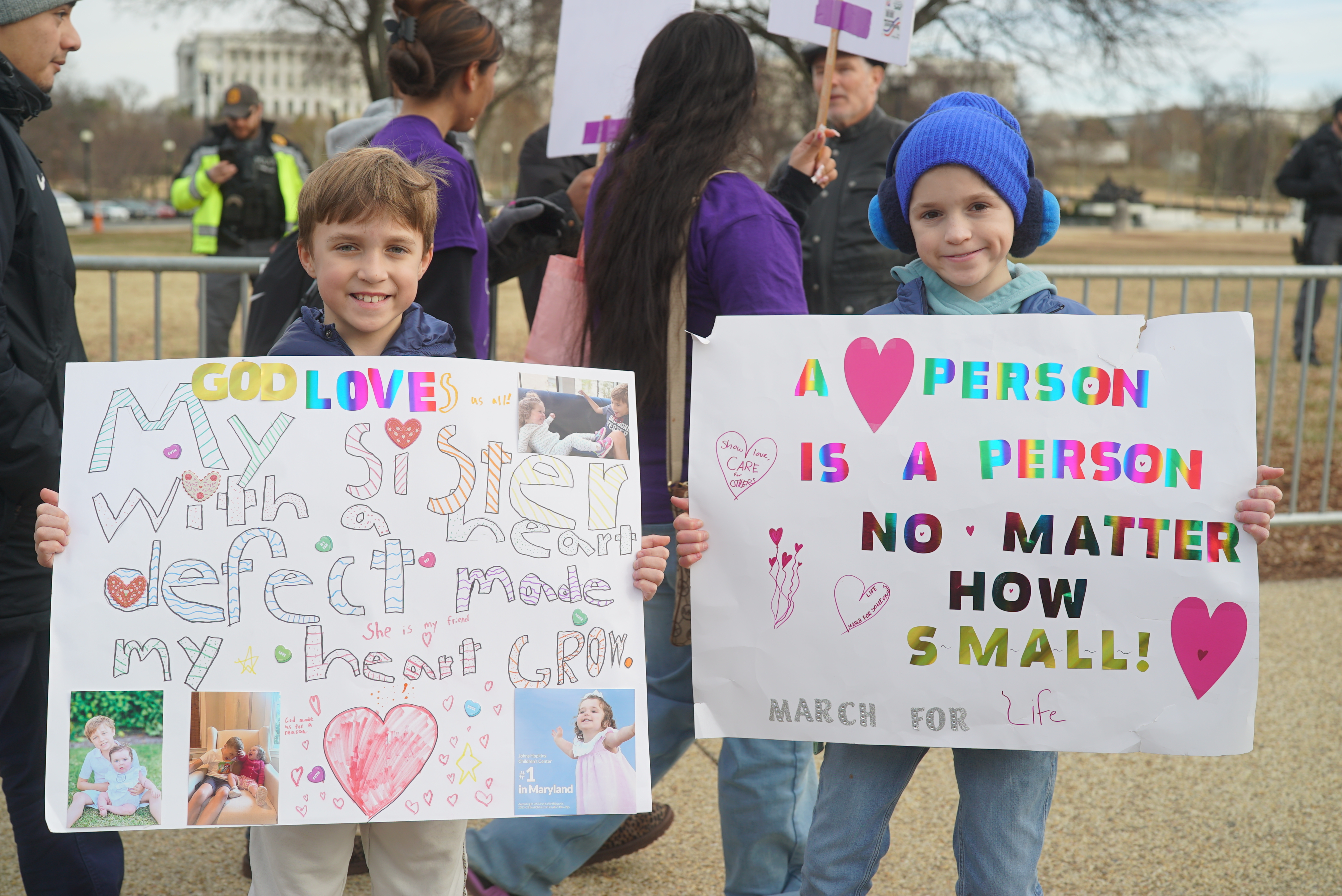 Otto and Max Kollme hold signs for their sister, Sofia, at the March for Life on Jan. 23, 2026. | Credit: Madalaine Elhabbal/EWTN News