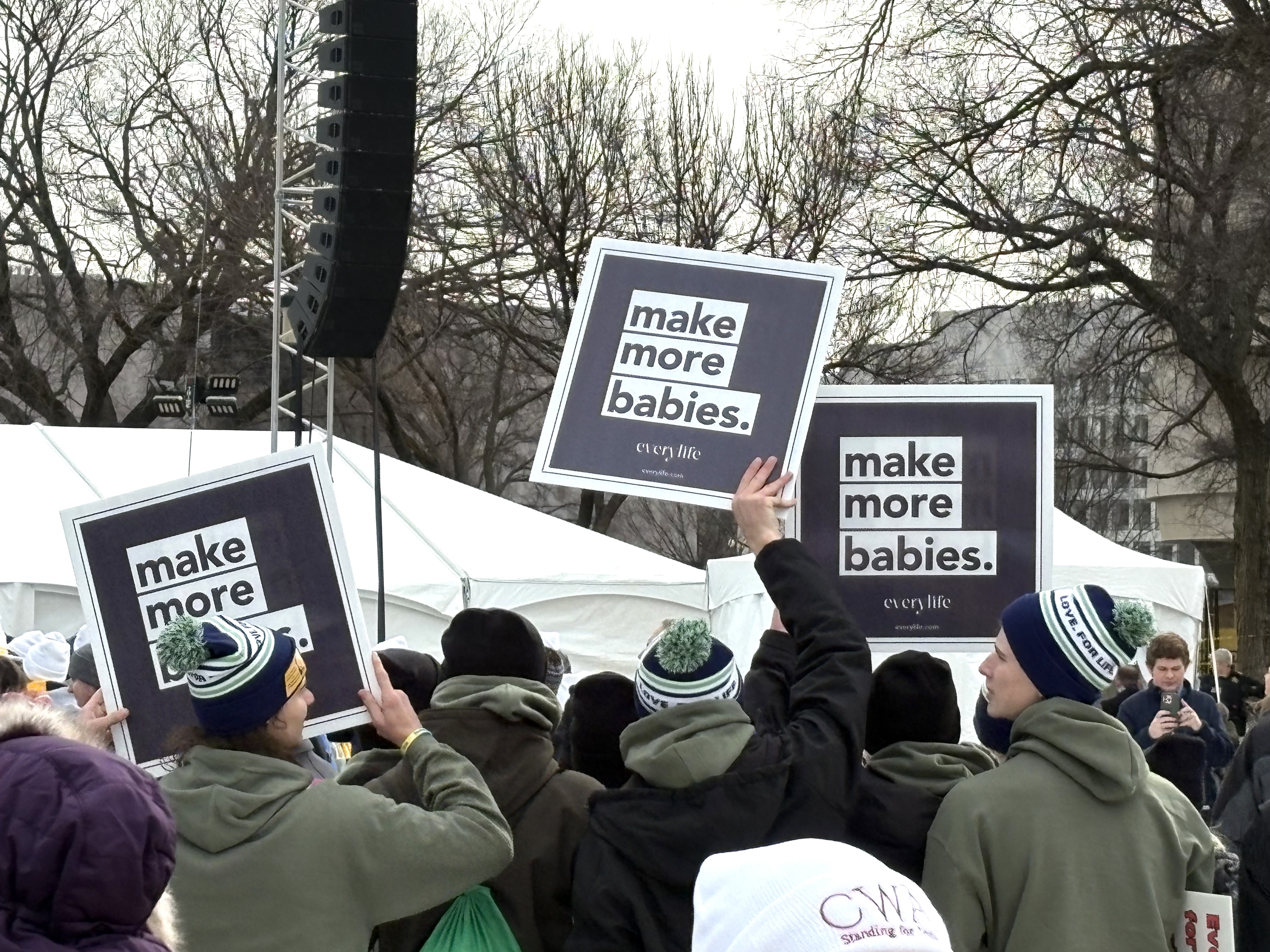 Attendees hold up “Make More Babies” signs at the March For Life on Jan. 23, 2026. | Credit: Tessa Gervasini/EWTN News