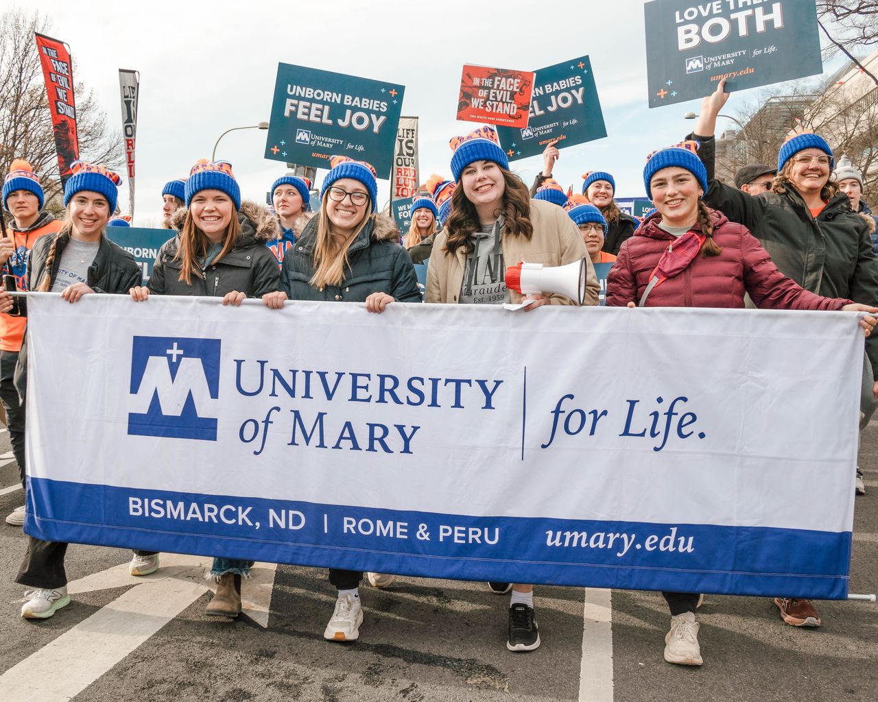 University of Mary students hold a banner at the March for Life in Washington, D.C., on Jan. 23, 2026. | Credit: University of Mary student photographer Regina Turner
