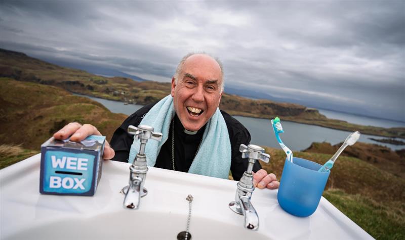 Bishop Brian McGee, the Scottish Catholic International Aid Fund (SCIAF) bishop president, climbed a hill overlooking Oban, Scotland, to bring attention to the annual Lent WEE BOX Appeal 2026, which is raising funding for local organizations in Ethiopia to bring clean water to communities. | Credit: Photo courtesy of SCIAF